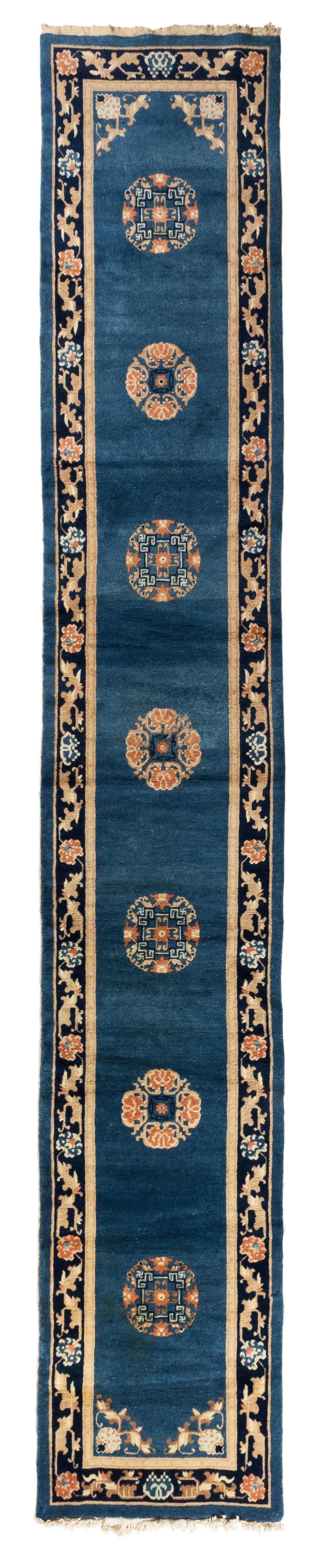 This is a lovely and pristine pair of antique blue gold black Art Deco Chinese runner rugs c. 1920-1930, each measuring 2.6 x 14.8 ft.