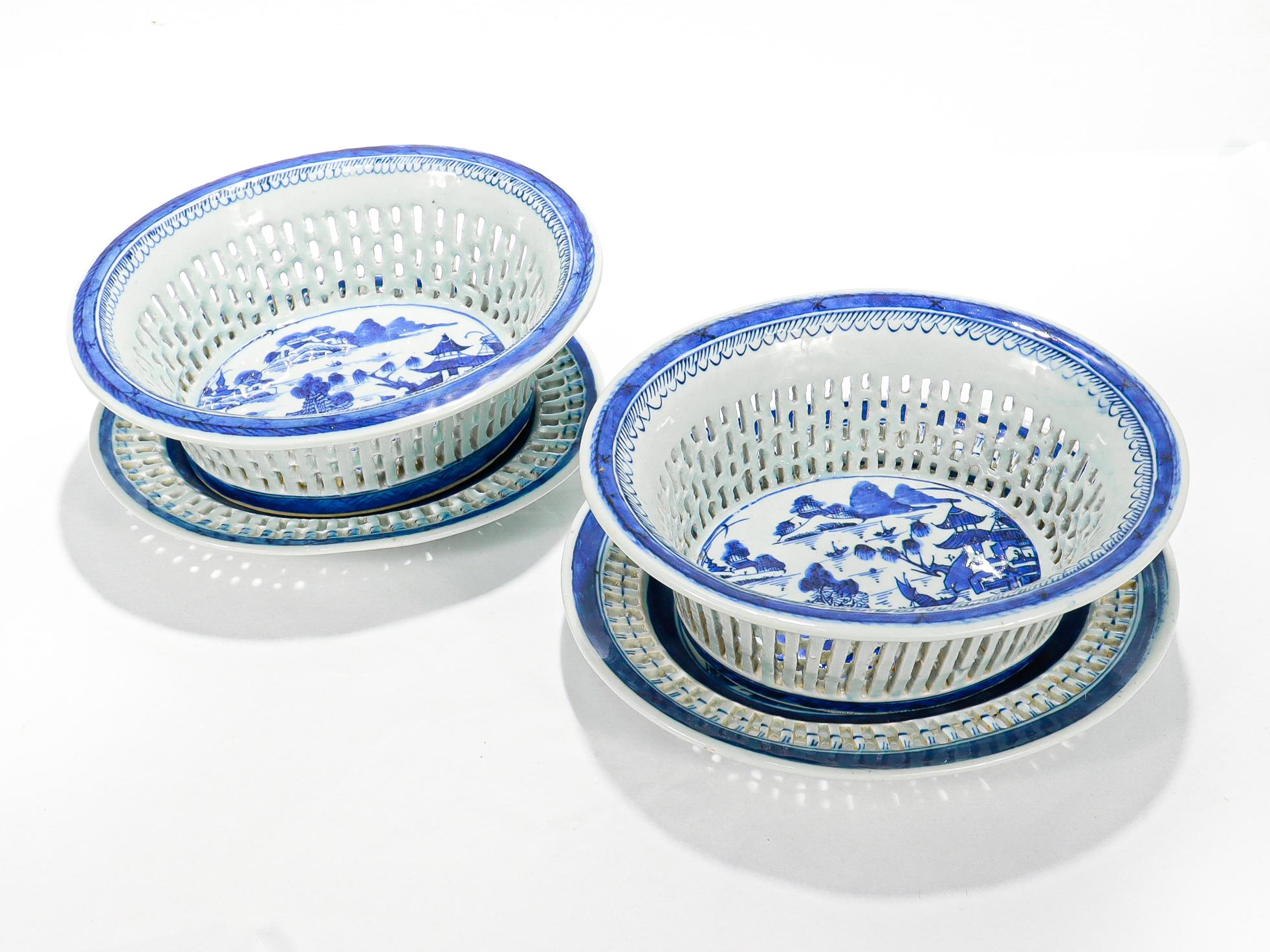 A fine pair of antique Chinese export porcelain chestnut baskets and underplates.

In the Canton pattern.

Decorated in underglaze blue.

Both plates and baskets are reticulated throughout and have blue underglaze border decoration.

The centers