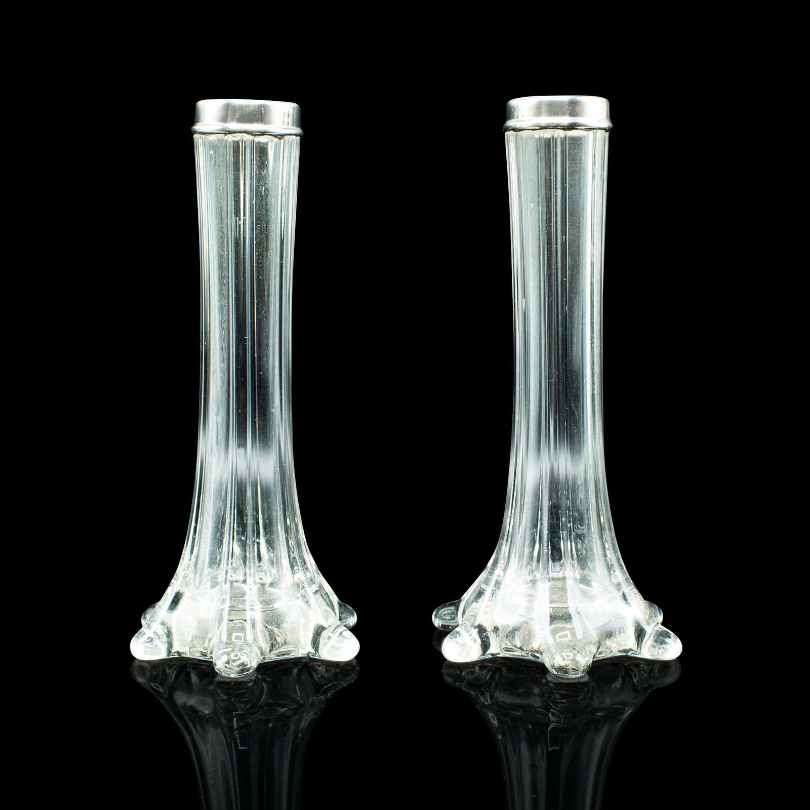 This is a pair of antique breakfast stem vases. An English, glass and silver collared posy vase, hallmarked to the late Victorian period, dated 1901.

Delightfully petite vases with appealing forms
Displaying a desirable aged patina