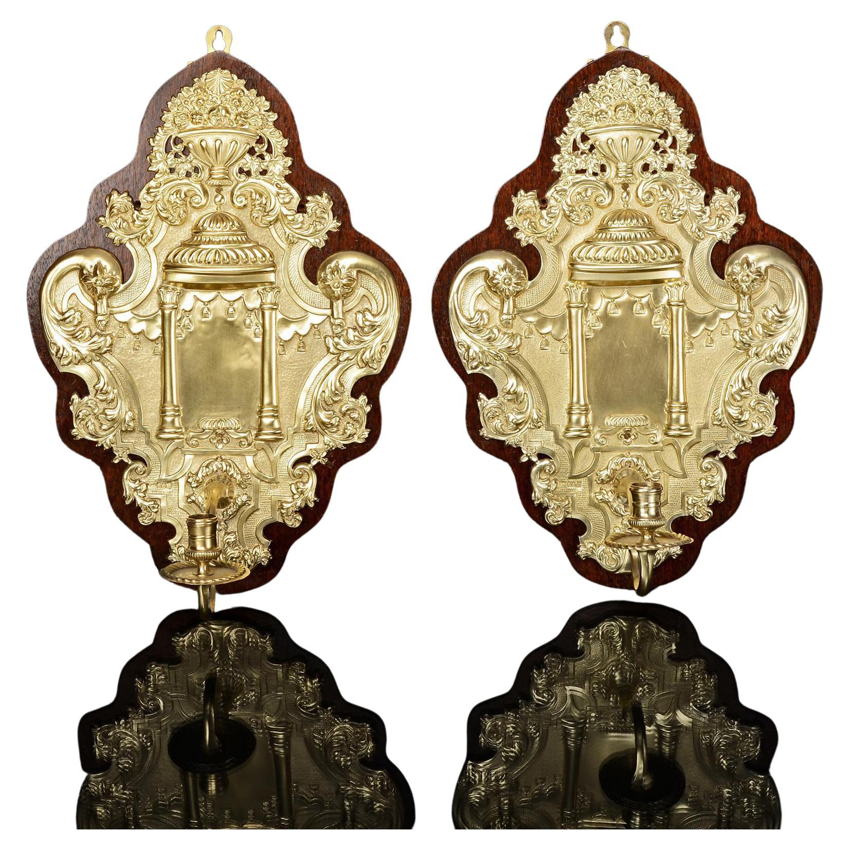 Coppia di antiche lampade da parete Britannia in argento e doratura
