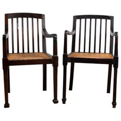 Pair of Antique British Colonial Teak and Rattan Hall Elbow Chairs, circa 1900