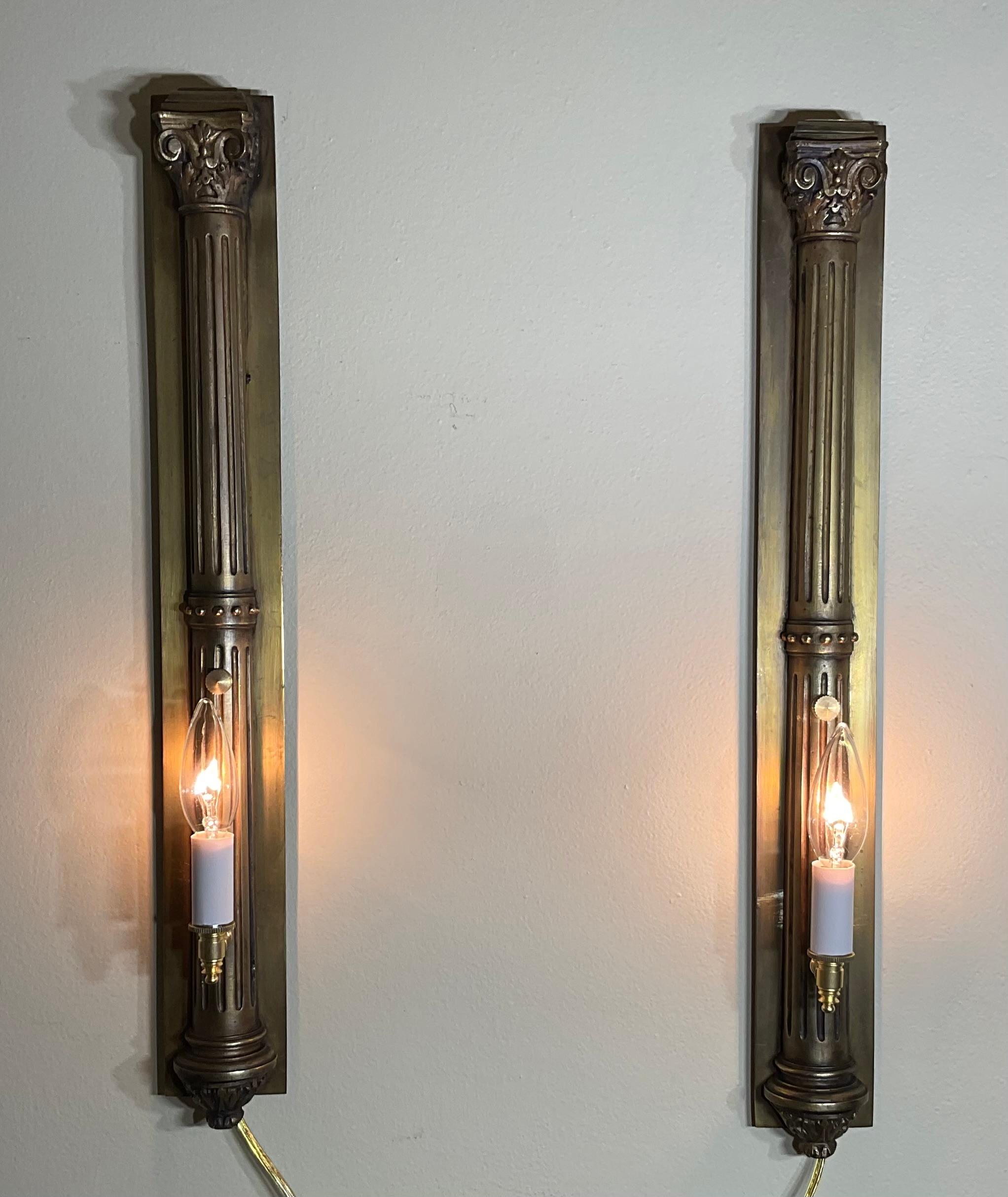 Step into a bygone era with this funky pair of antique bronze and brass sconces. These exquisite One Of A Kind wall lights are a testament to timeless craftsmanship and will add a touch of grandeur to any space.
Crafted from a combination of durable
