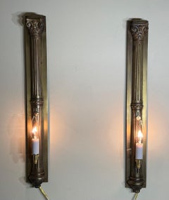 Coppia di lampade da parete in bronzo antico e ottone - Eleg Eleg