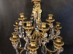 Paire d'appliques anciennes en bronze et cristal de Paul Garnier