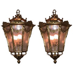 Pair of Antique Bronze and Glass Lanterns in the French Taste
