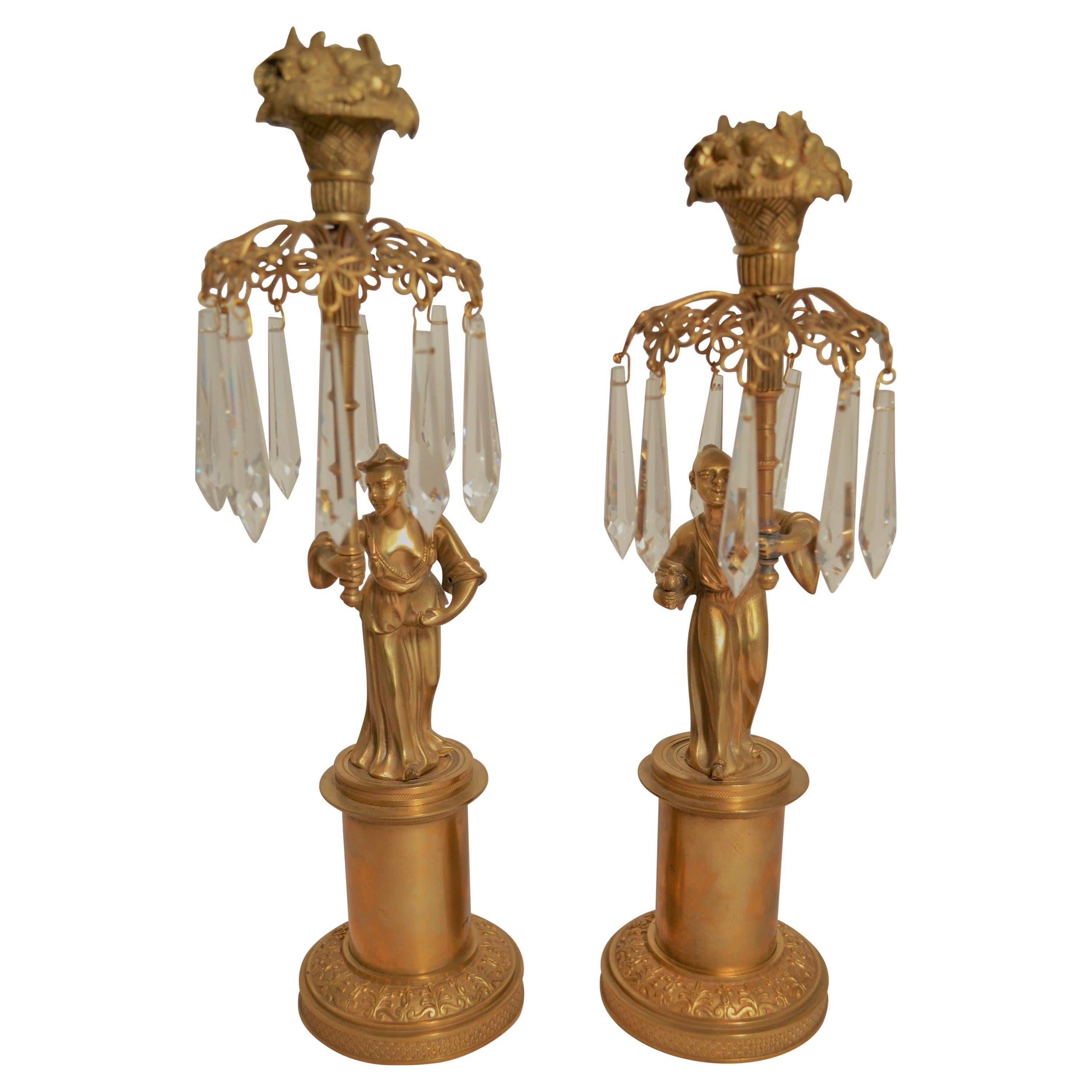 Pair of Antique Bronze Chinoiserie Figural Candlesticks For Sale