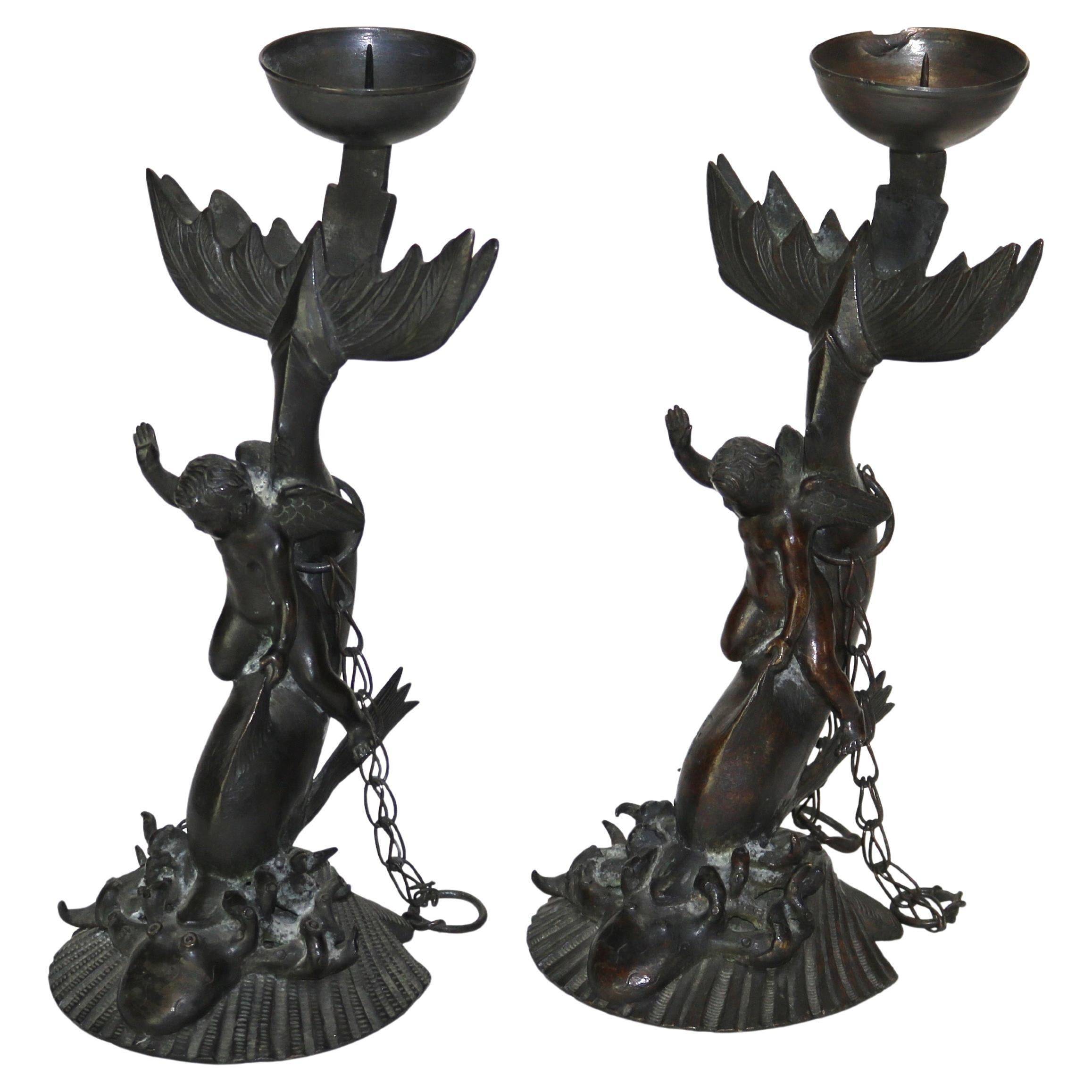Pair of Antique Bronze Figural Candlesticks with Cherubs Riding Dolphins C1820