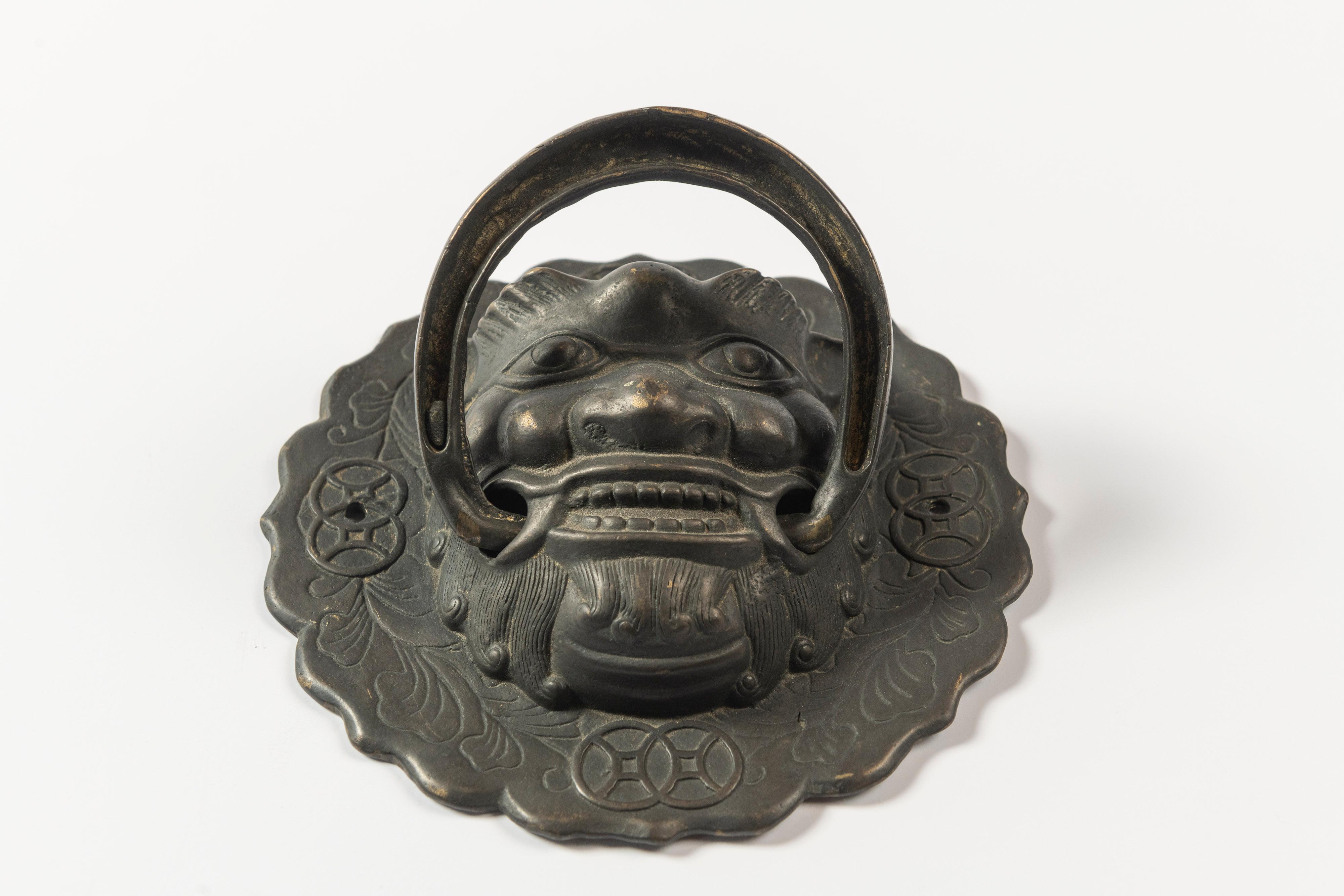 Molded Pair of Antique Bronze Foo Dog Door Knockers For Sale