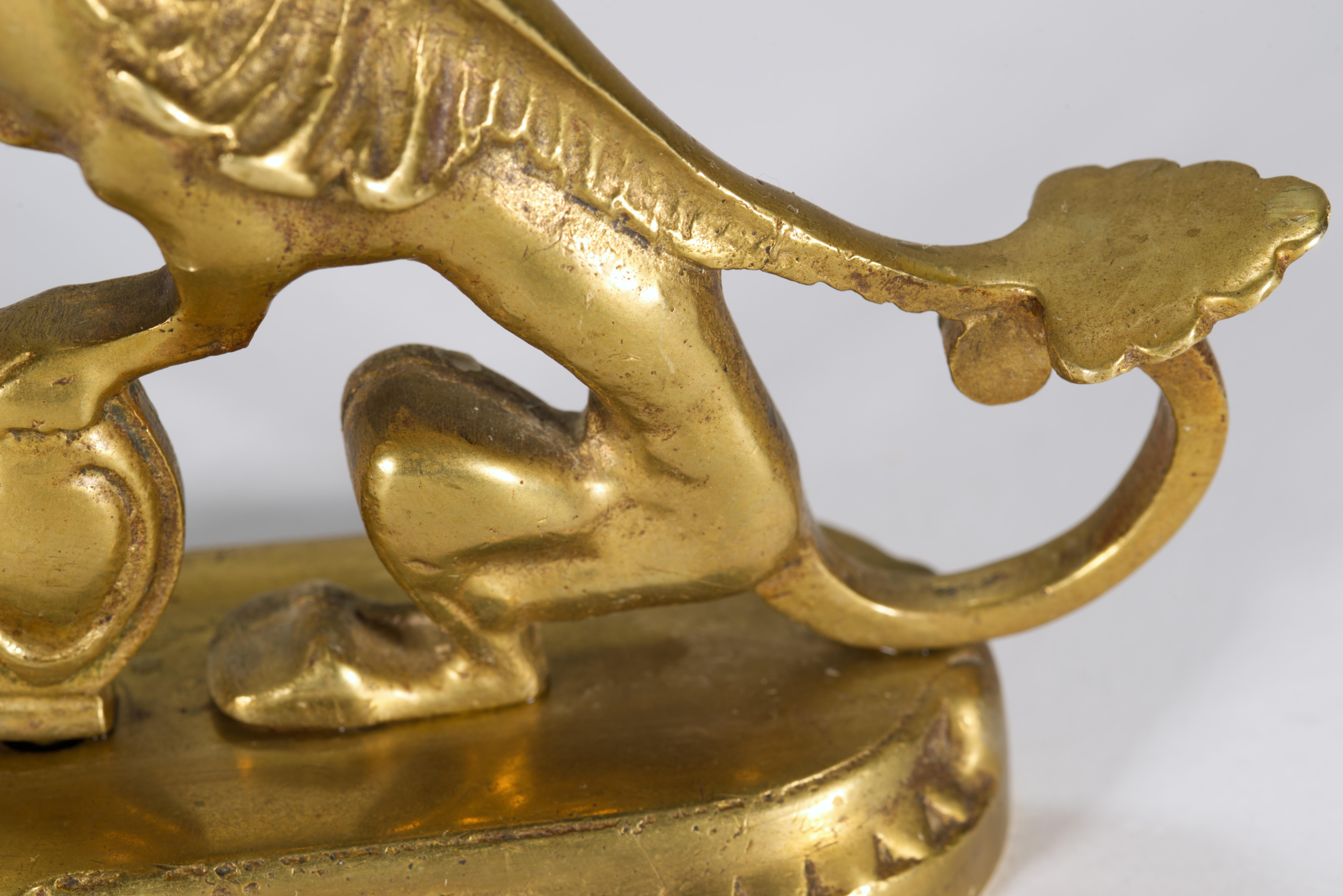Cast Pair of Antique Bronze Griffin Candle Holders For Sale