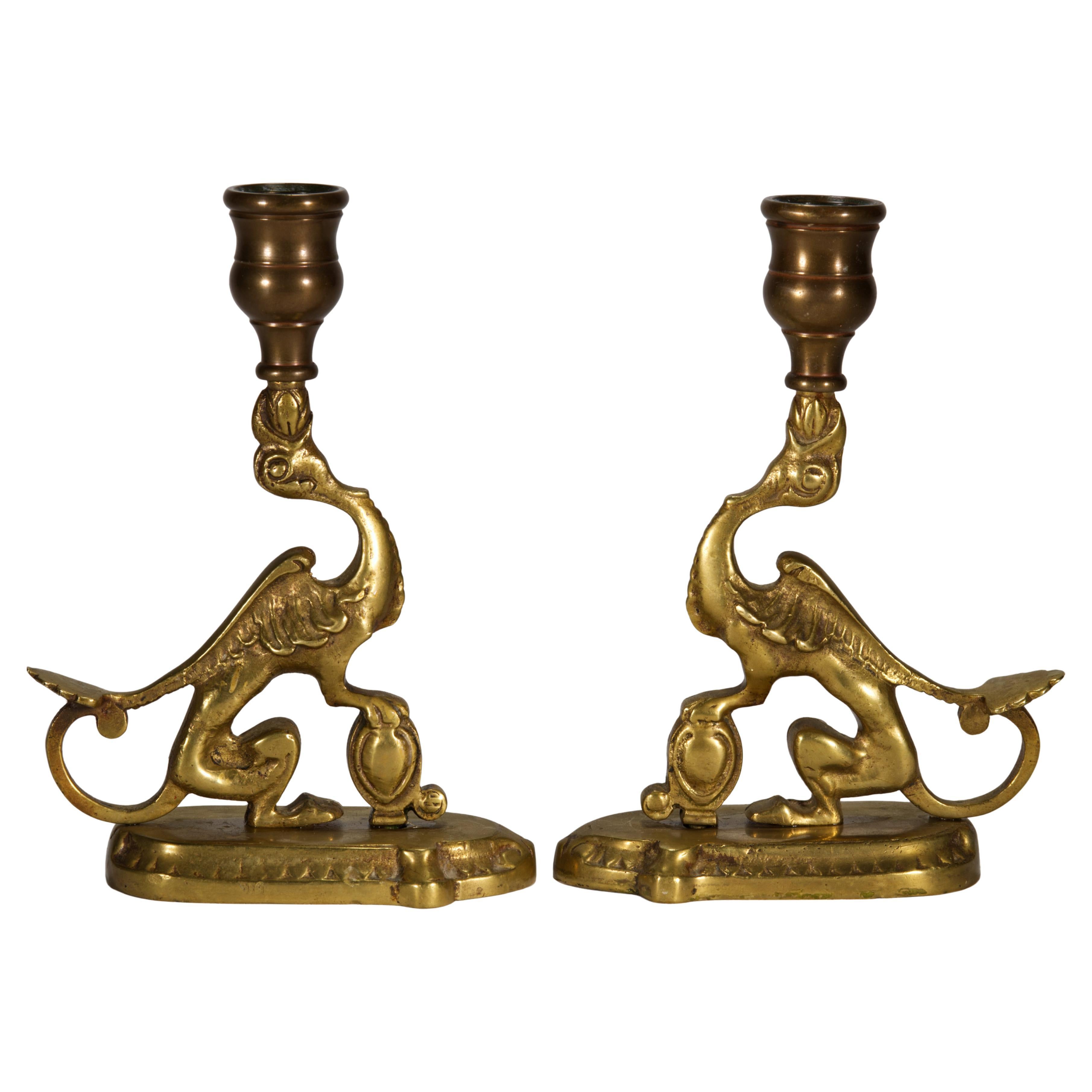 Pair of Antique Bronze Griffin Candle Holders