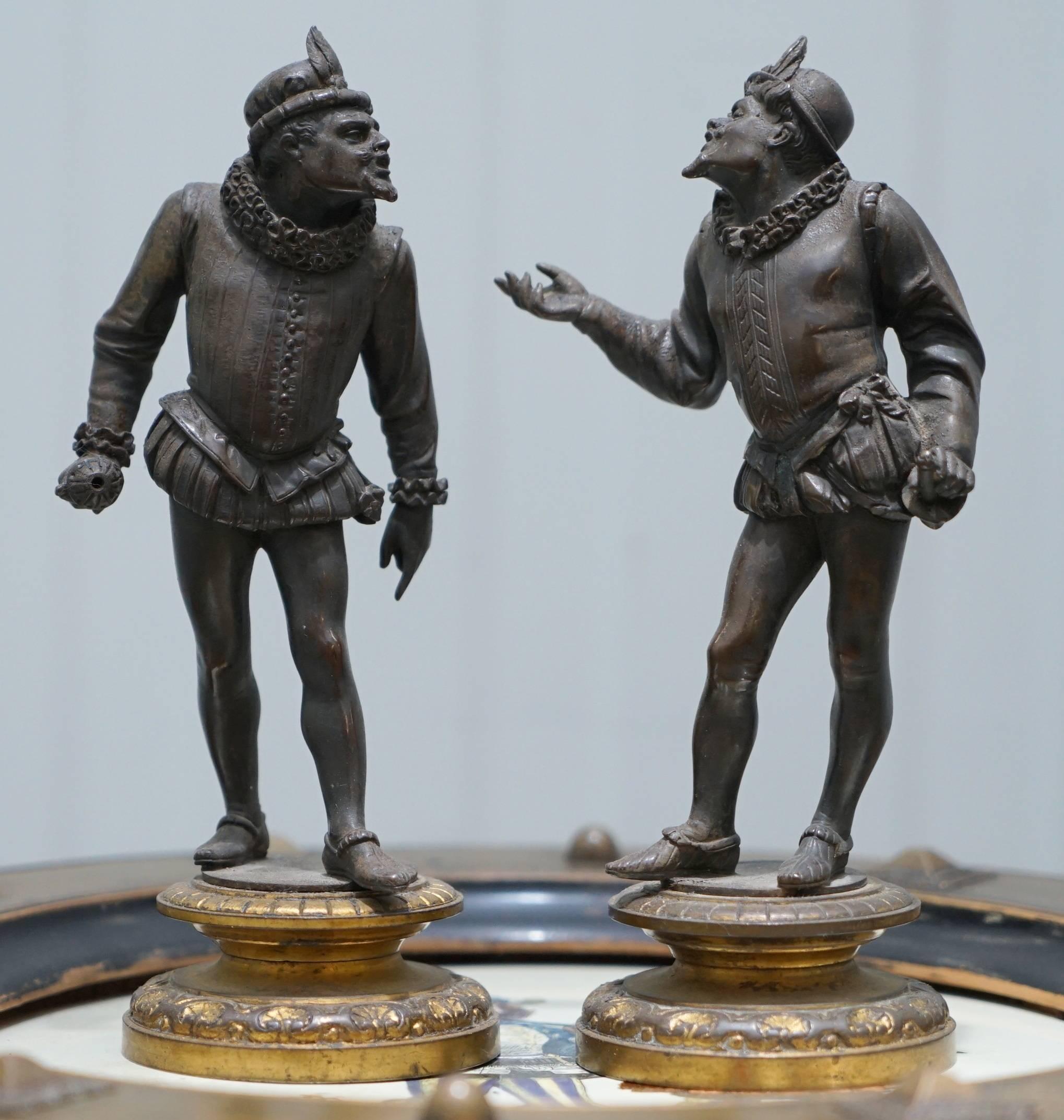 We are delighted to offer for sale this pair of very good looking bronze dandy’s getting ready to duel

As you can see there is some insult has taken place and gloves have been thrown down, you can see one glove cast into the base. The pair look