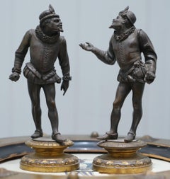 Pair of Antique Bronze Statues of Chaps Getting Ready to Duel Gloves Thrown Down