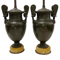 Paire de lampes à vase en bronze ancien