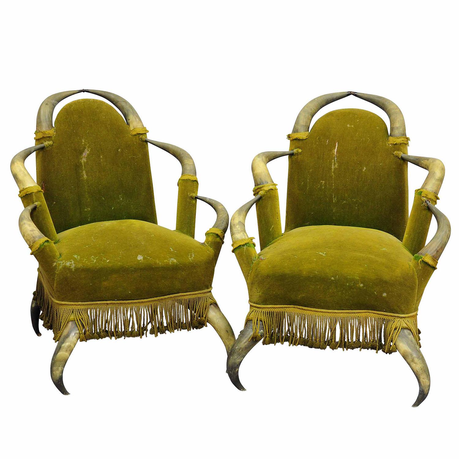 Pair of Antique Bull Horn Chairs Austria 1870

A pair antique bull horn chairs, from a noble villa in Austria. The seats are with antique green velvet fabric. The chairs are in unrestored original condition, fabric needs to be renewed.

At the