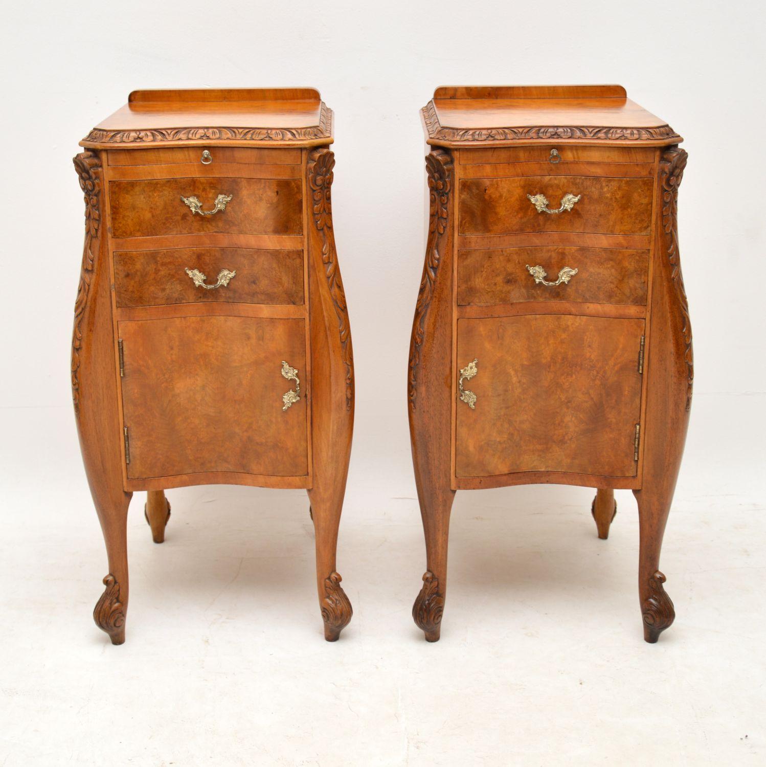 Fabulous pair of antique walnut bedside cabinets with some wonderful features and in excellent condition. They date from circa 1920s period and have just been French polished. These cabinets have some wonderful shaping and good carvings around the