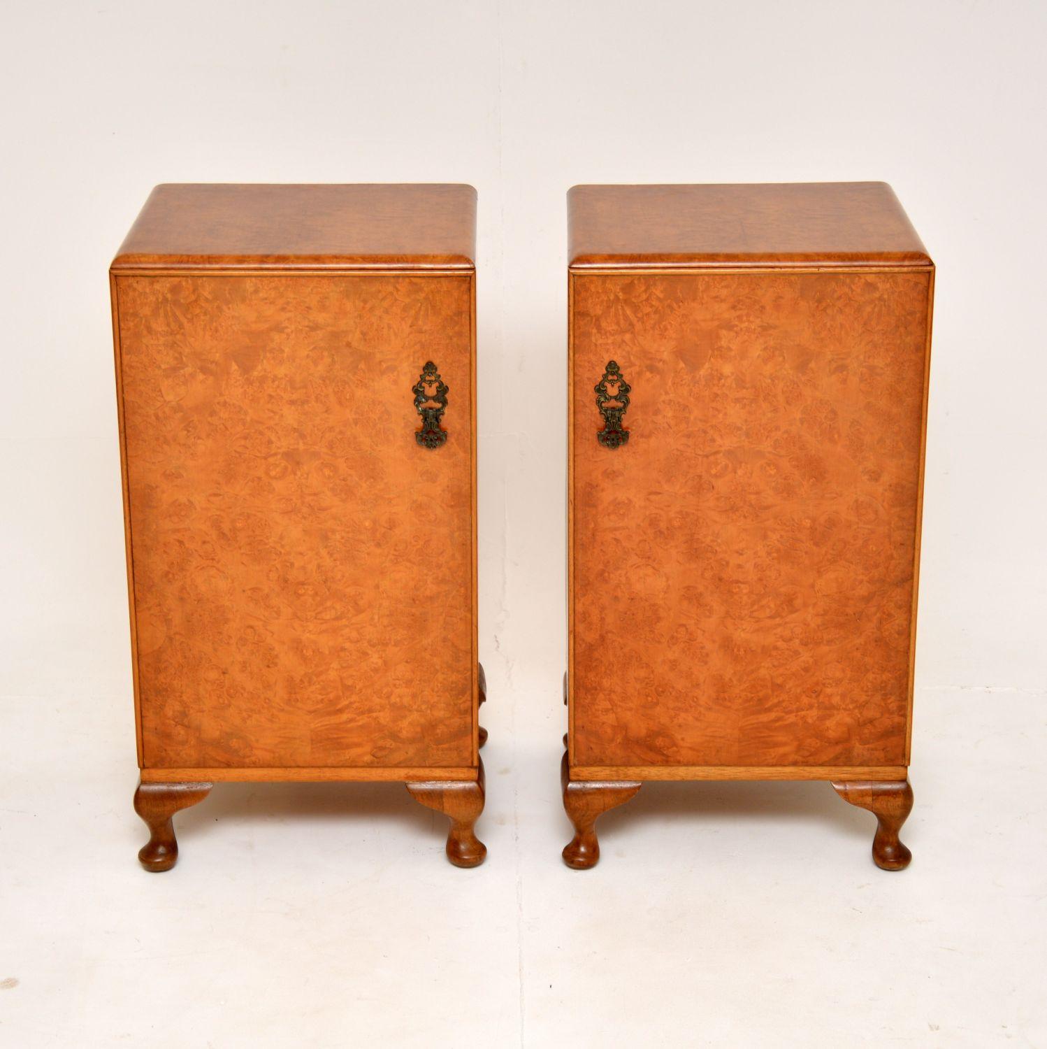 A stunning pair of antique bedside cabinets in burr walnut. They were made in England, and date from the 1930’s.

They are beautifully made and are a very useful size. The door fronts and tops have gorgeous burr walnut grain patterns, they sit on
