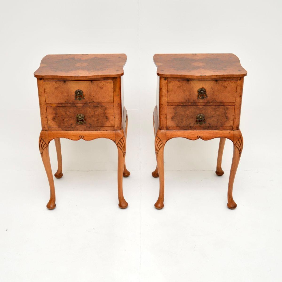 A stunning pair of antique burr walnut bedside cabinets, made in England and dating from around the 1900-1920 period.

They are of superb quality and display gorgeous burr walnut grain patterns throughout. The tops have serpentine shaped fronts with
