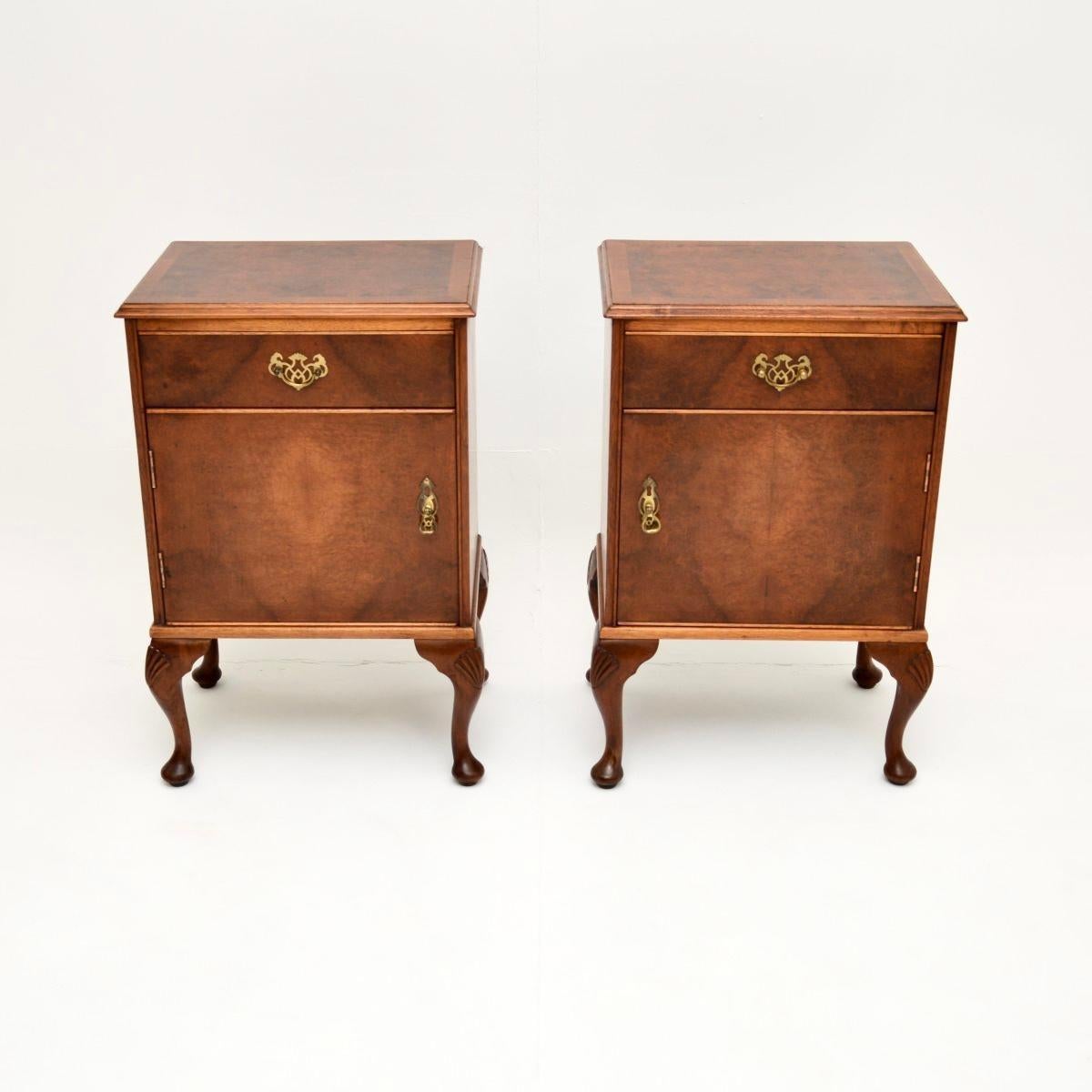 A stunning pair of antique burr walnut bedside cabinets, made in England and dating from around the 1930’s period.

They are of very good quality and display gorgeous burr walnut grain patterns throughout. The tops have cross banded edges, there is