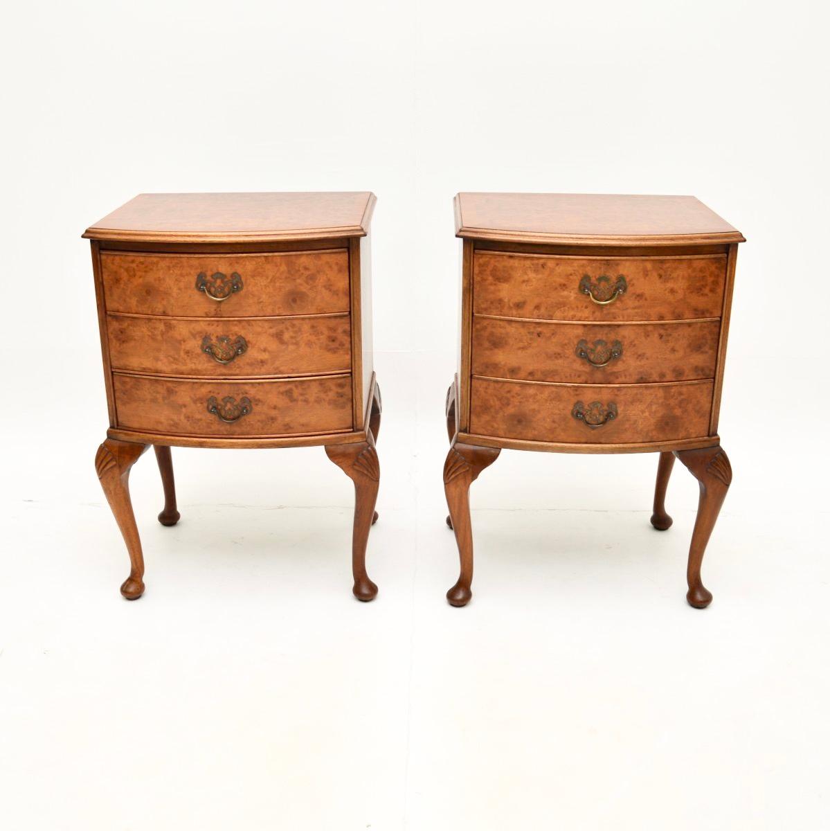 A beautiful and very impressive pair of antique burr walnut bedside chests. They are in the Queen Anne style, they were made in England and date from around the 1930’s.

The quality is lovely, they sit on elegant cabriole legs with shell carving at
