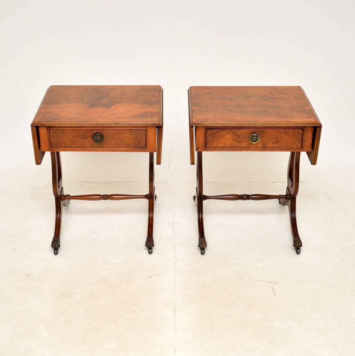 A fantastic pair of antique drop leaf side tables in burr walnut. They are in the Regency style, they were made in England and date from around the 1930s.

The quality is excellent, they are very well made and are a useful Size. The tops have drop