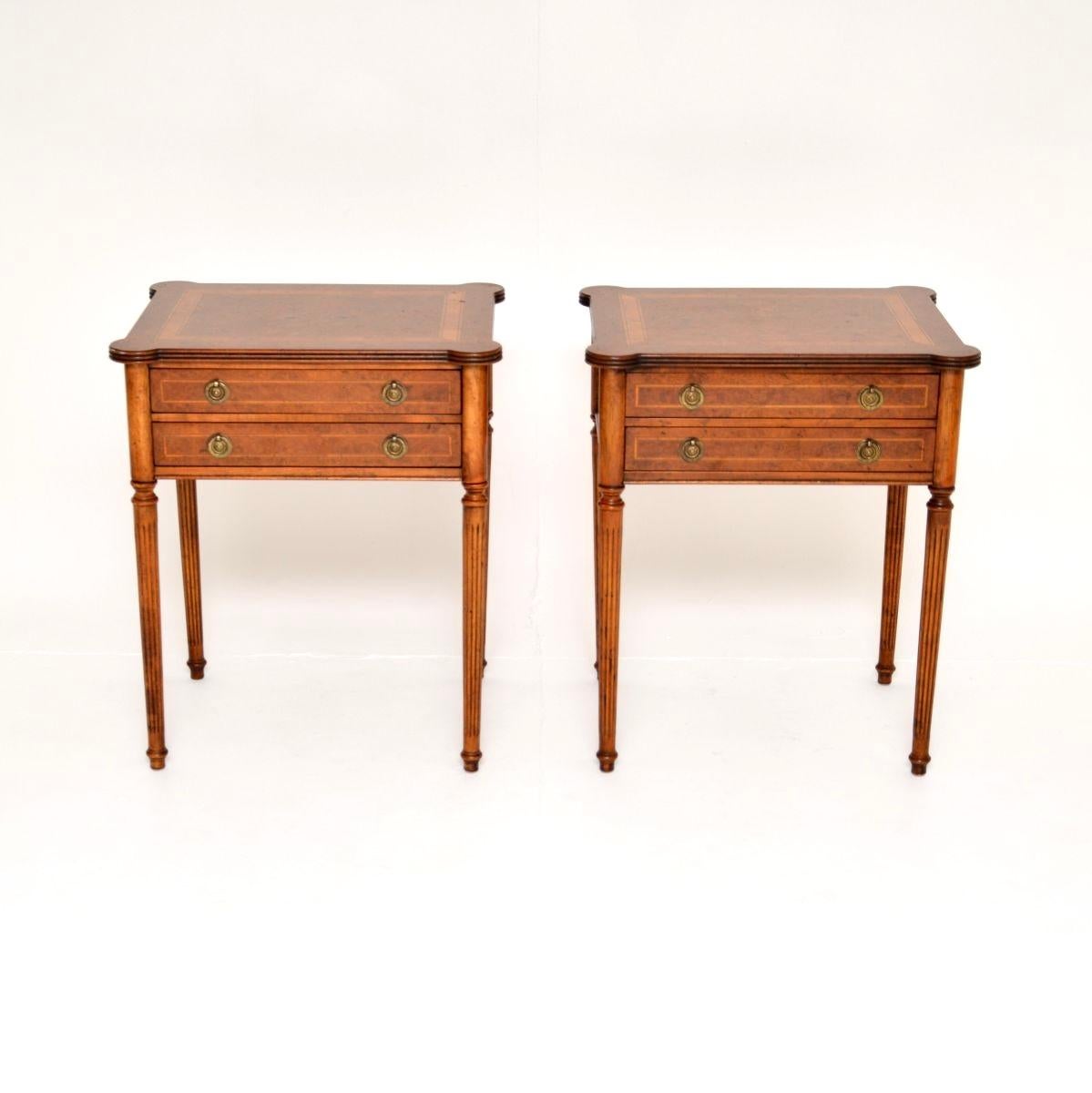 A superb pair of antique burr walnut side tables in the Georgian style. They were made in England, and they date from around the 1950’s.

The quality is outstanding, they have a beautiful design and are a very useful size. There are two drawers with