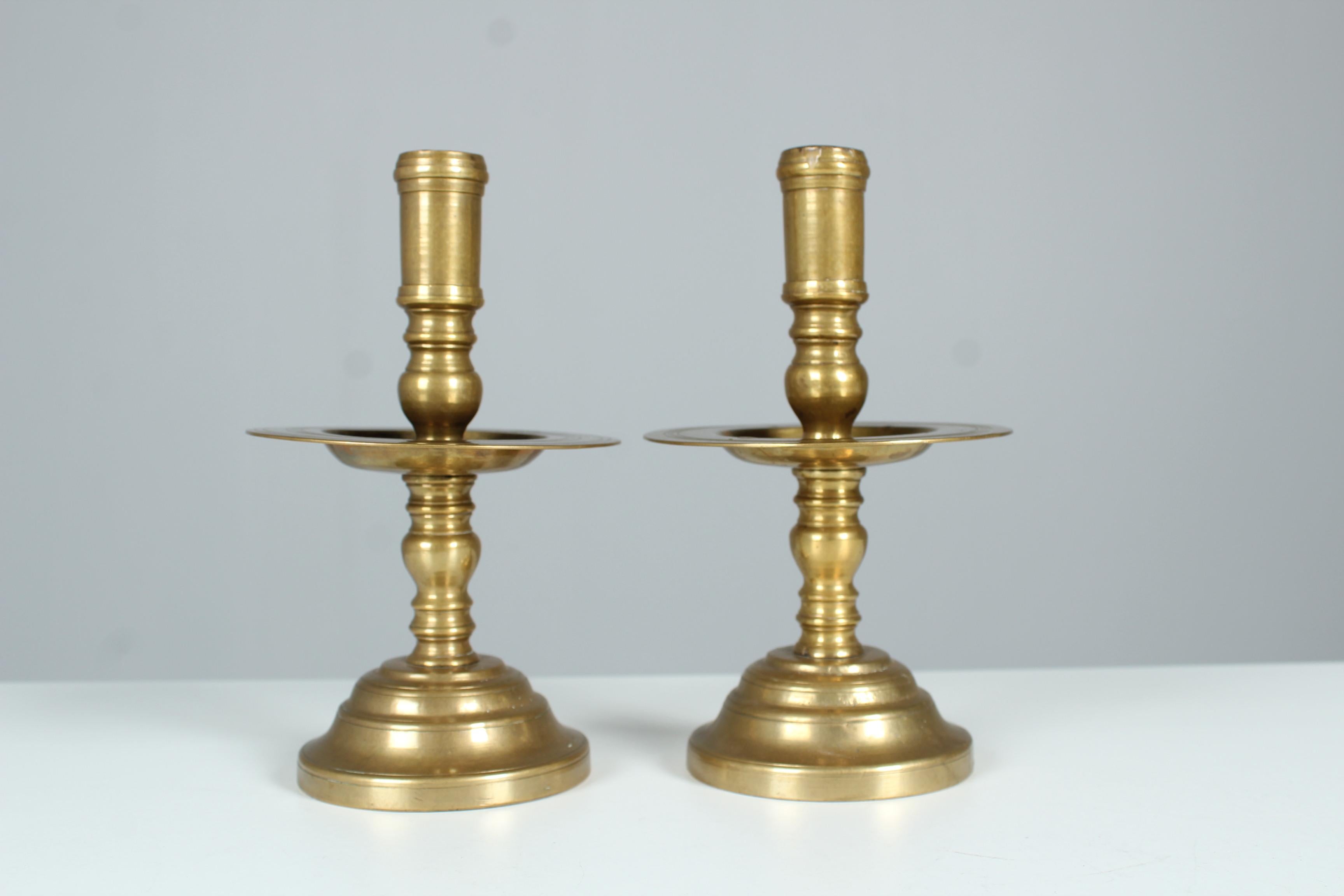 Great antique pair of brass candlesticks, gilded.
France, late 19th century.