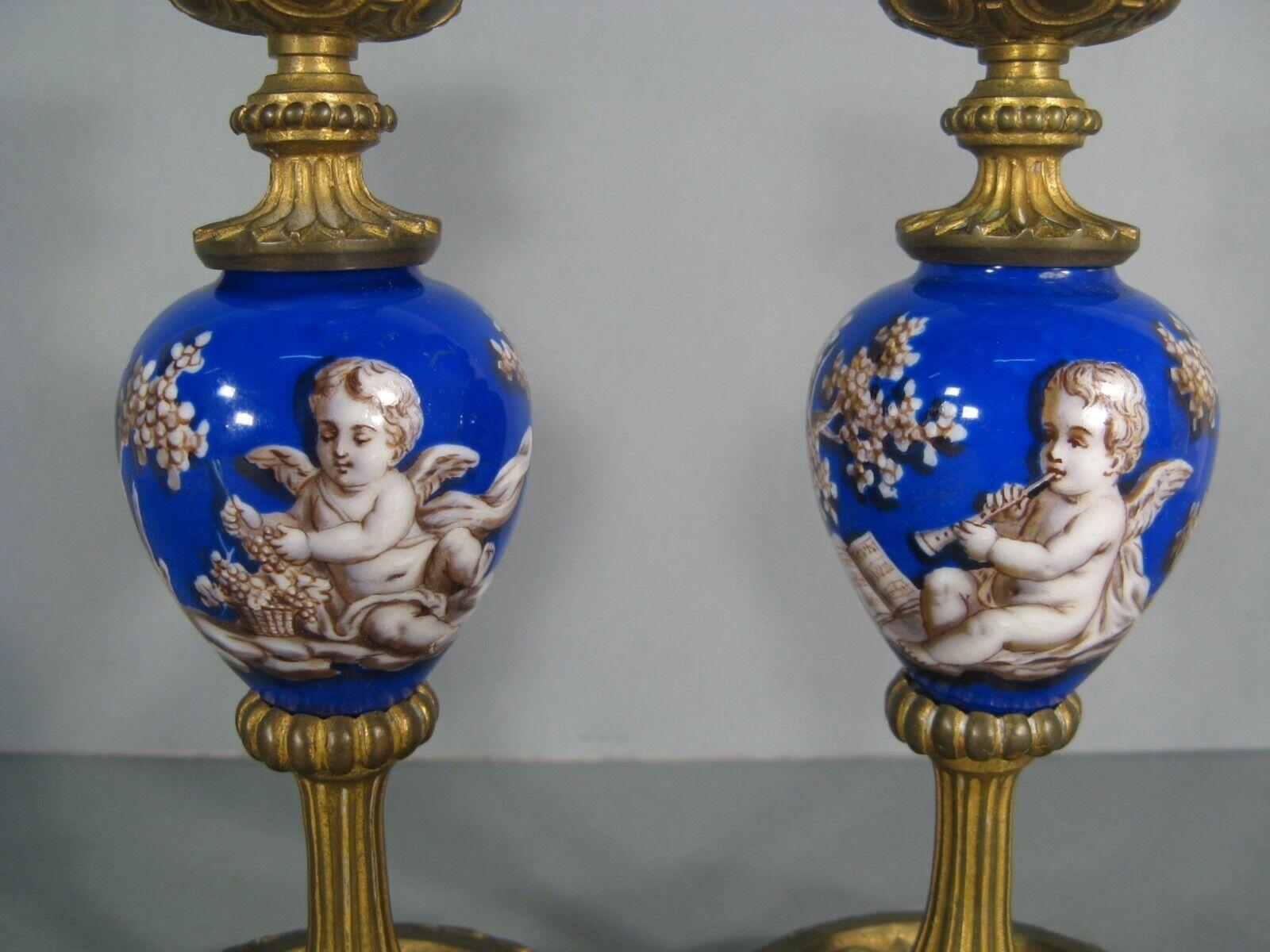 19th Century Pair of Antique Candlesticks in Romantic Style with Putti Decor - 1Y161