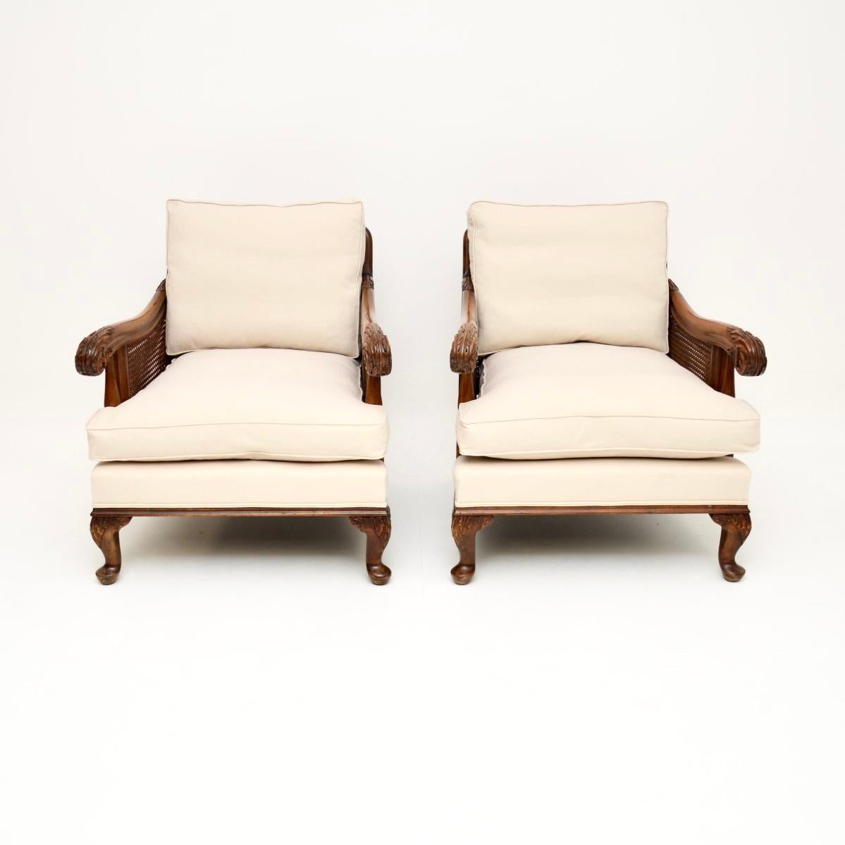 A stunning pair of antique cane bergere armchairs, made in England and dating from around the 1910-20’s.

They are of superb quality and are very comfortable. The solid birch frames are very well made, the scrolled arms and cabriole legs have