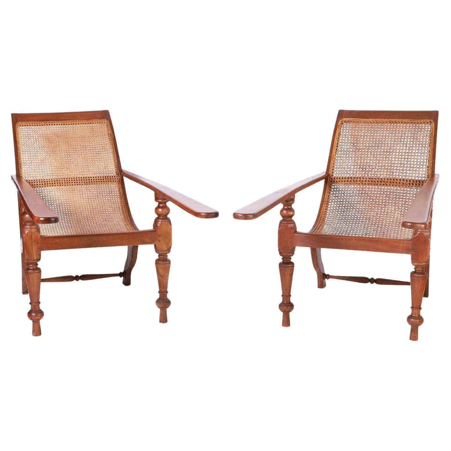 Pair of Antique Caned British Colonial Planters Chairs For Sale