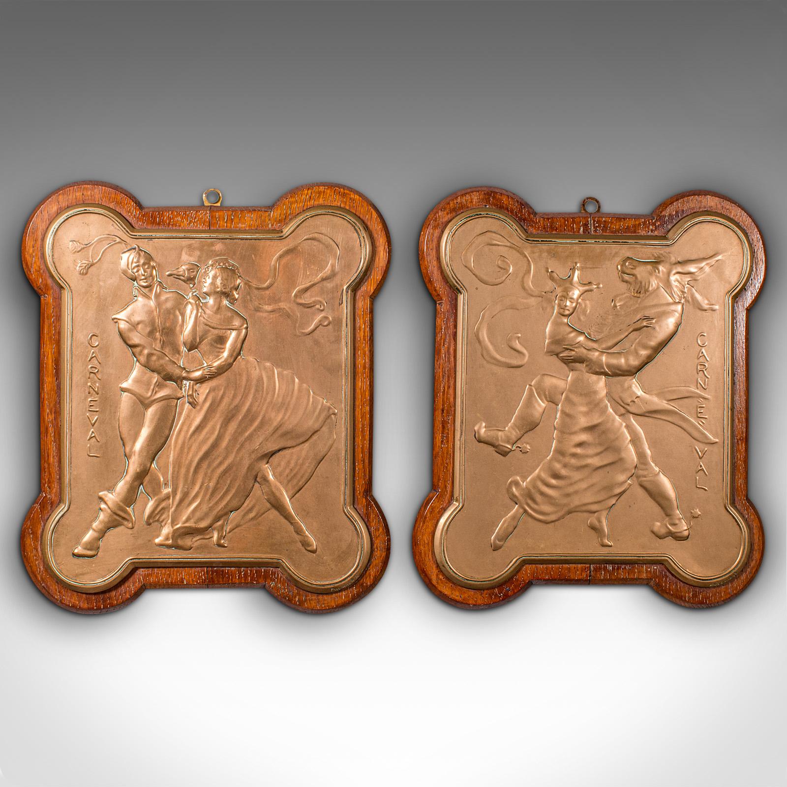 This is a pair of antique carnival plaques. A Venetian, bronze on oak decorative wall plates, dating to the late Victorian period, circa 1900.

Fascinating plaques, of superb quality and distinction
Displaying a desirable aged patina and in good