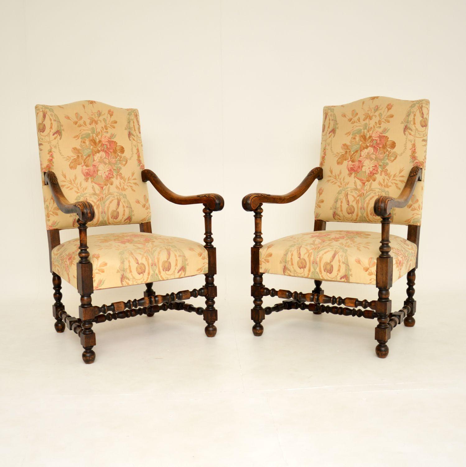 A wonderful pair of antique armchairs in the Carolean revival style. These were made in England, they date from around the 1890-1910 period.

They are of lovely quality, with beautiful acanthus leaf carving on the arms and excellent turned,