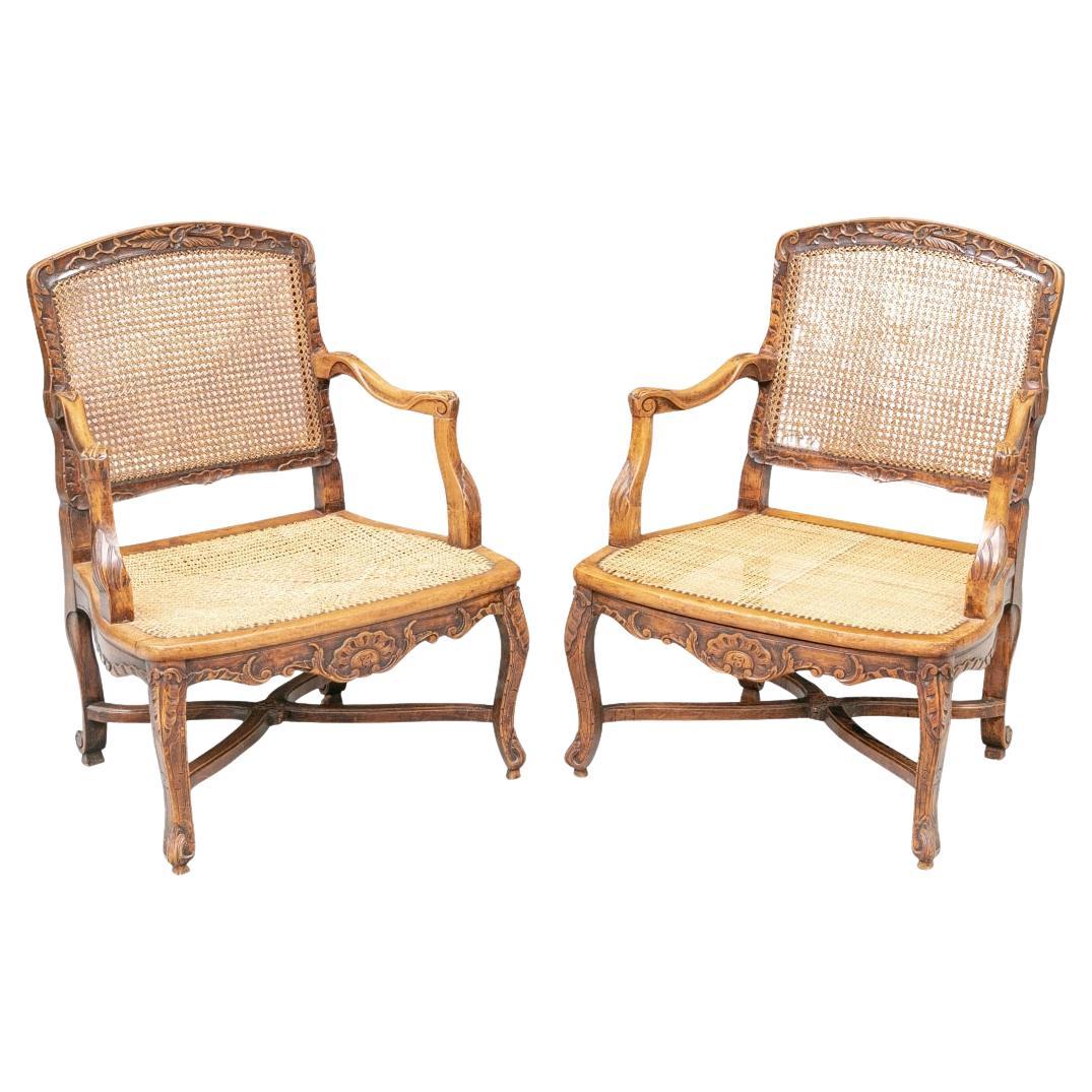 Pair Of Antique Carved And Caned  French Provincial Fauteuils  For Sale