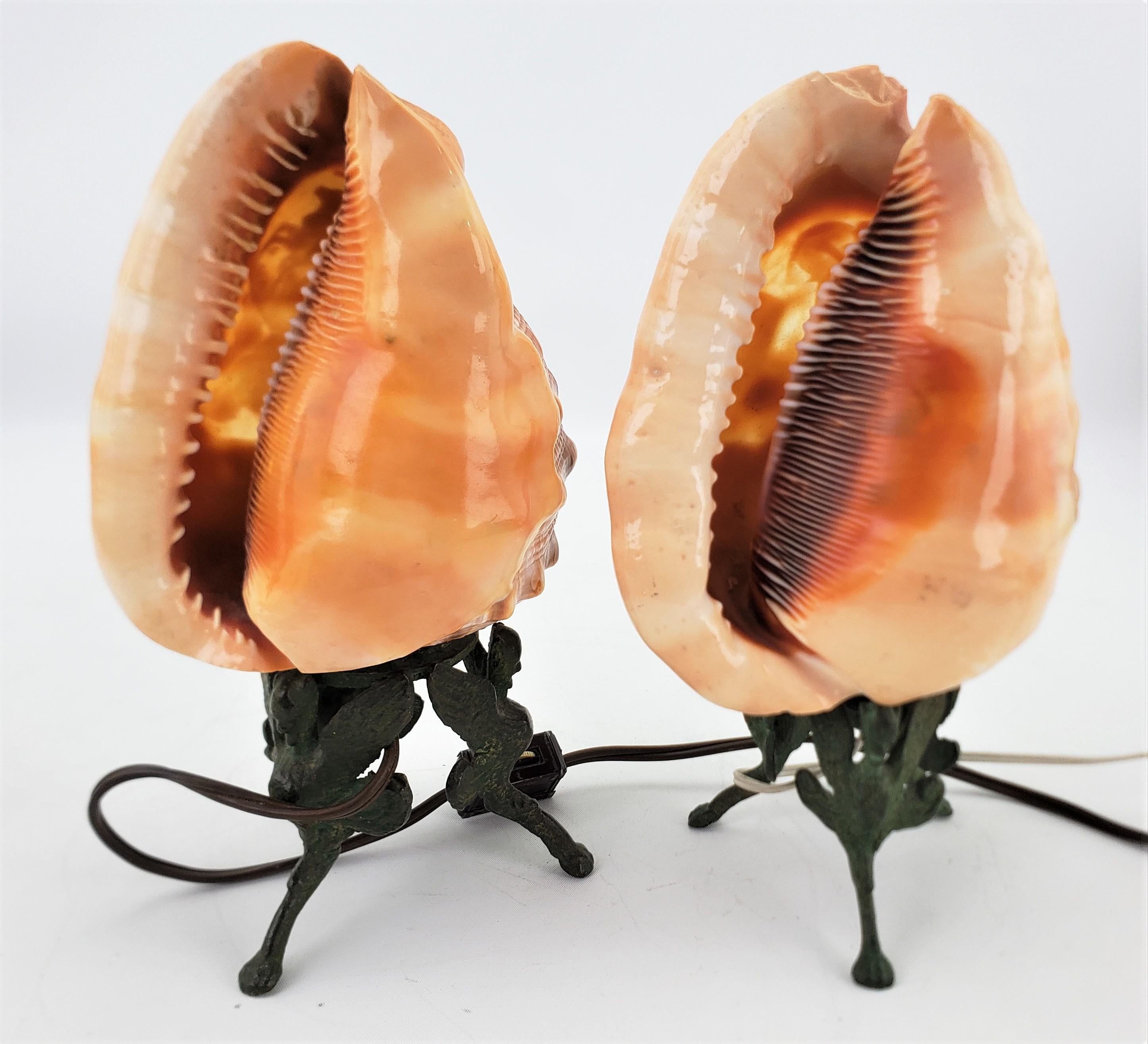 Metal Pair of Antique Carved Conch Shell Accent Table Lamps with Mythological Motif For Sale