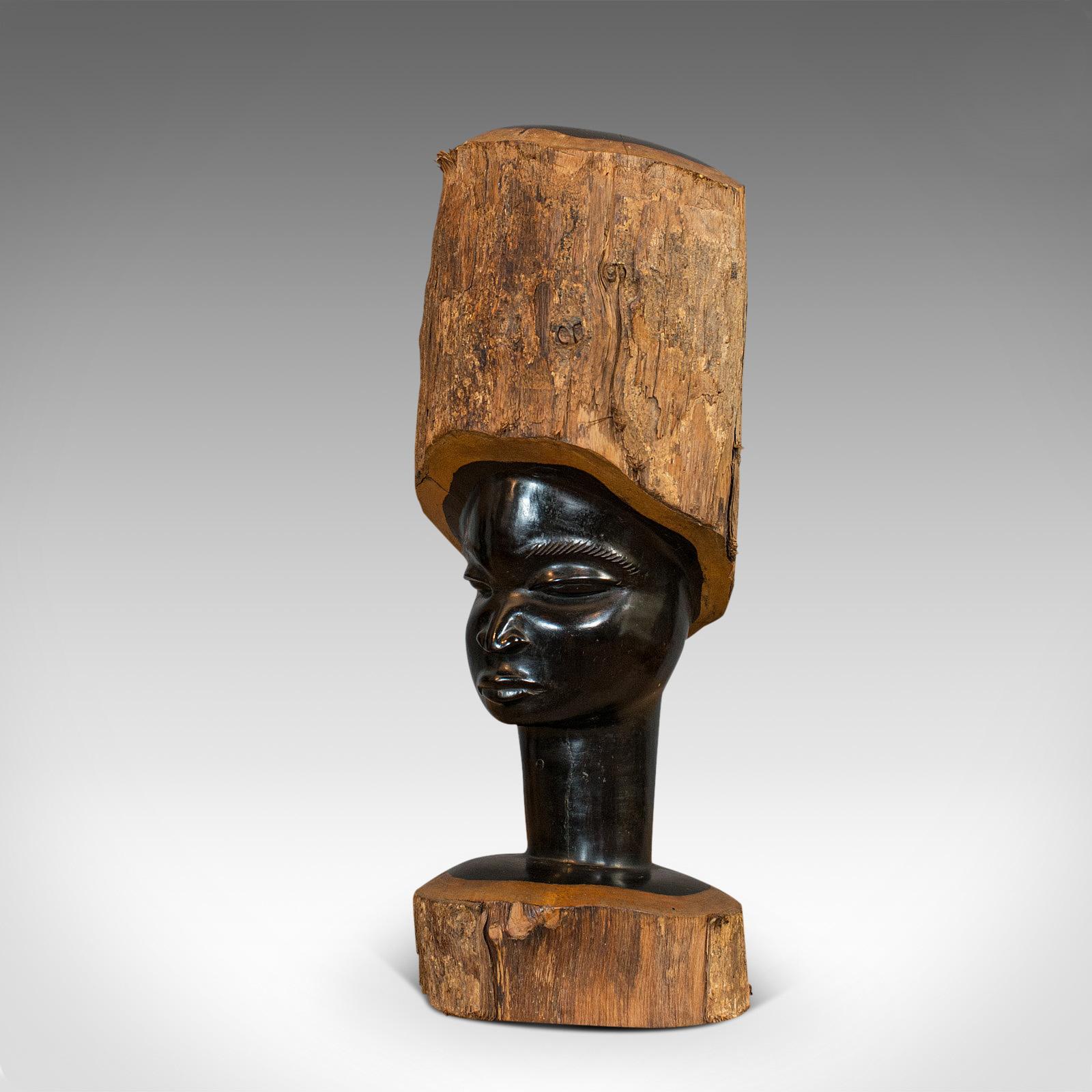 ebony carved african heads
