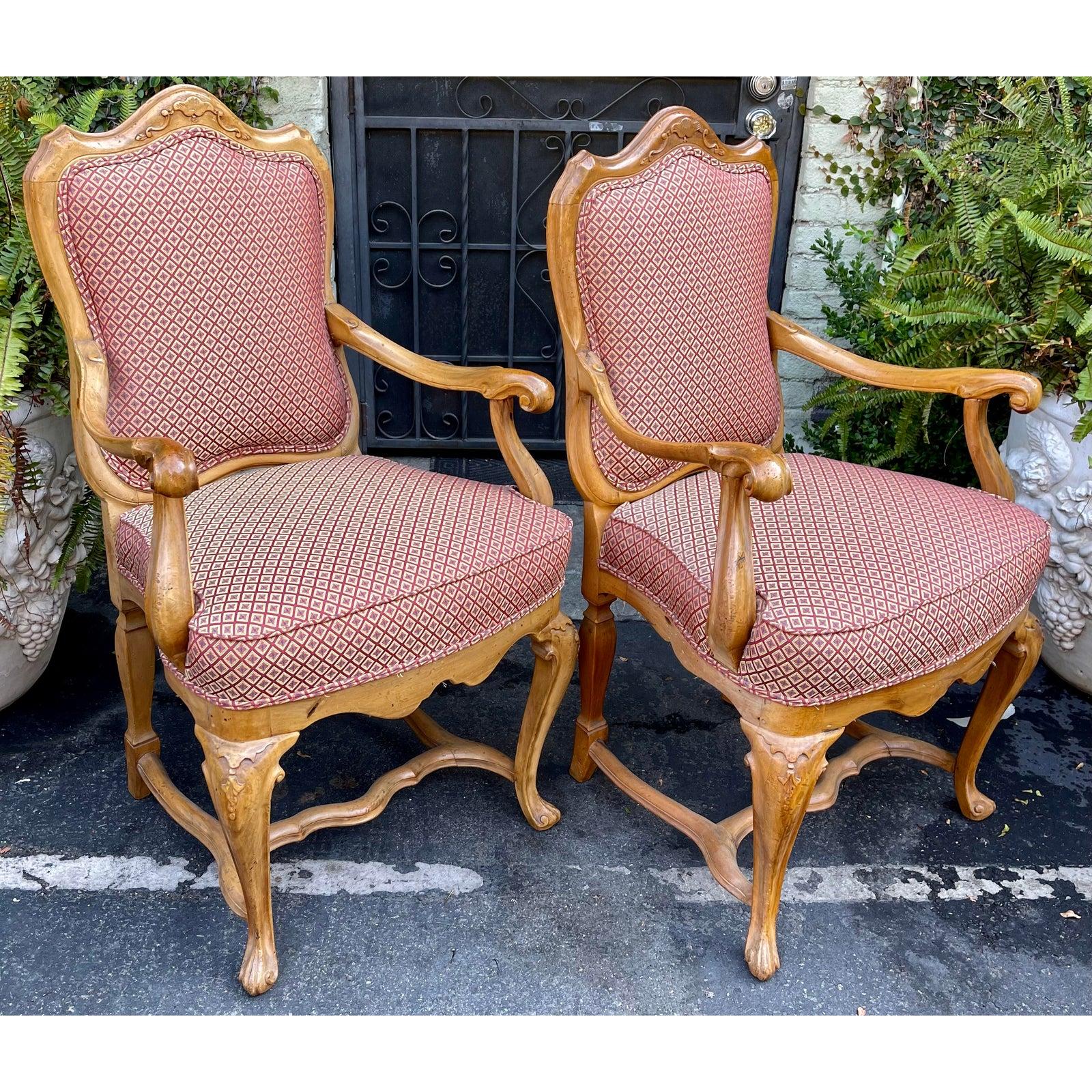 Antique carved Italian arm chairs - a pair.

Additional information:
Materials: Walnut
Color: Red
Period: 19th century
Styles: Italian
Number of Seats: 2
Item Type: Vintage, antique or pre-owned
Dimensions: 24