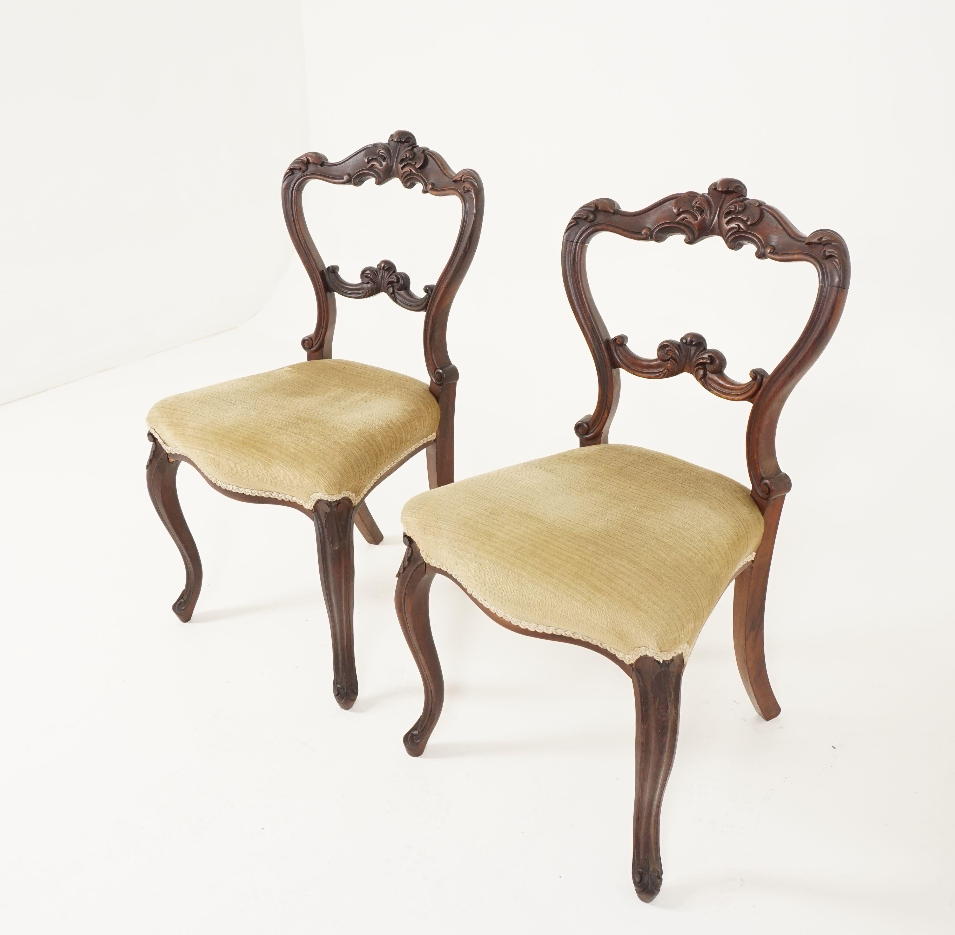 Pair of antique carved walnut occasional chairs, Scotland, 1870, B2462

Scotland, 1870
Solid walnut
Original finish
Carved top rail
Shaped supports to the side
Lower carved rail
Serpentine upholstered seat
Standing on cabriole legs to the back
Nice