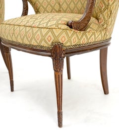 Coppia di antichi mobili imbottiti in mogano intagliato  Poltrone da camino