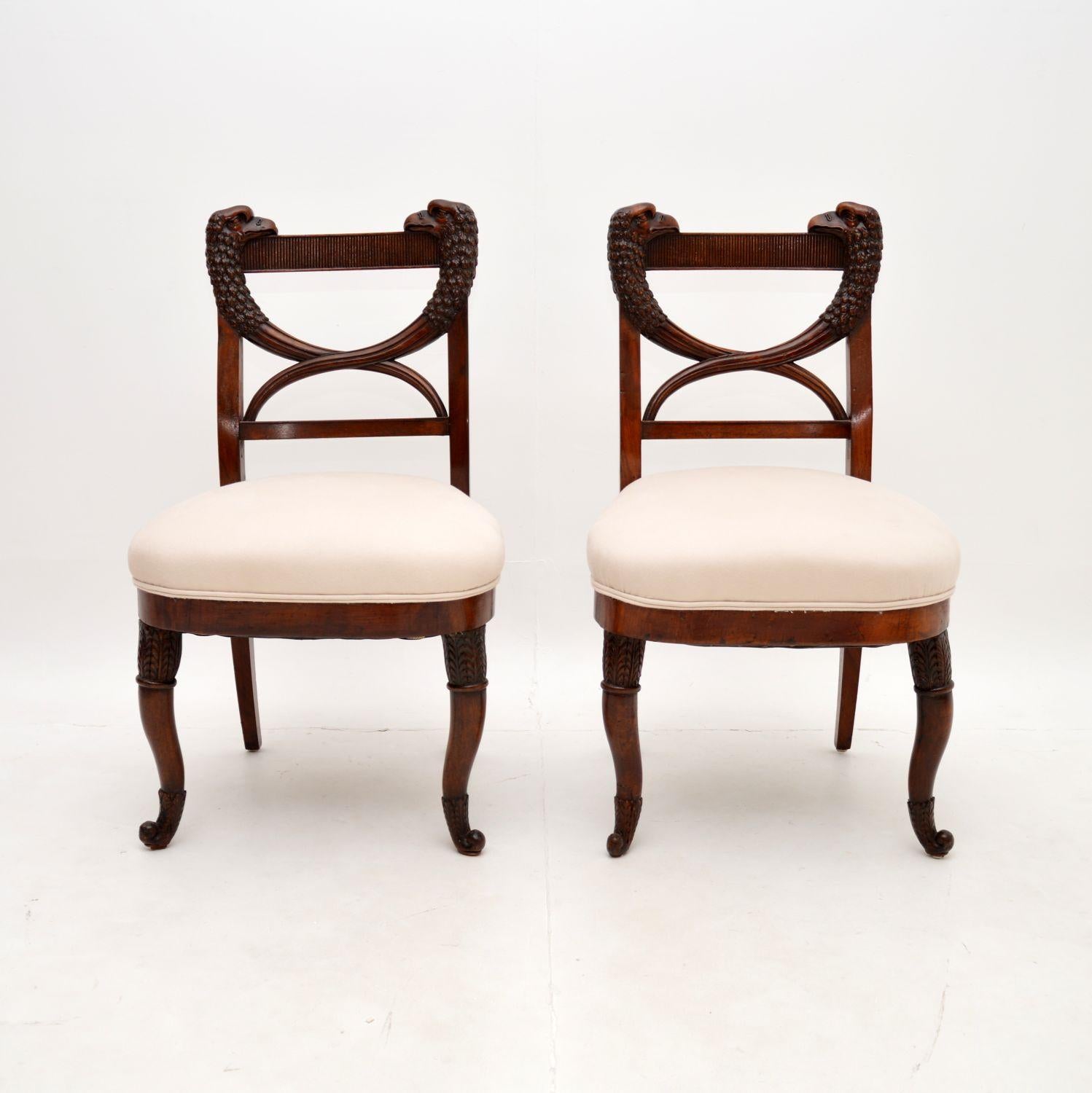 A fantastic pair of antique carved side chairs. They were made in continental Europe, possibly Denmark, or somewhere close and they are quite early, dating from around the 1790-1820 period, or even earlier.

The quality is outstanding, they have