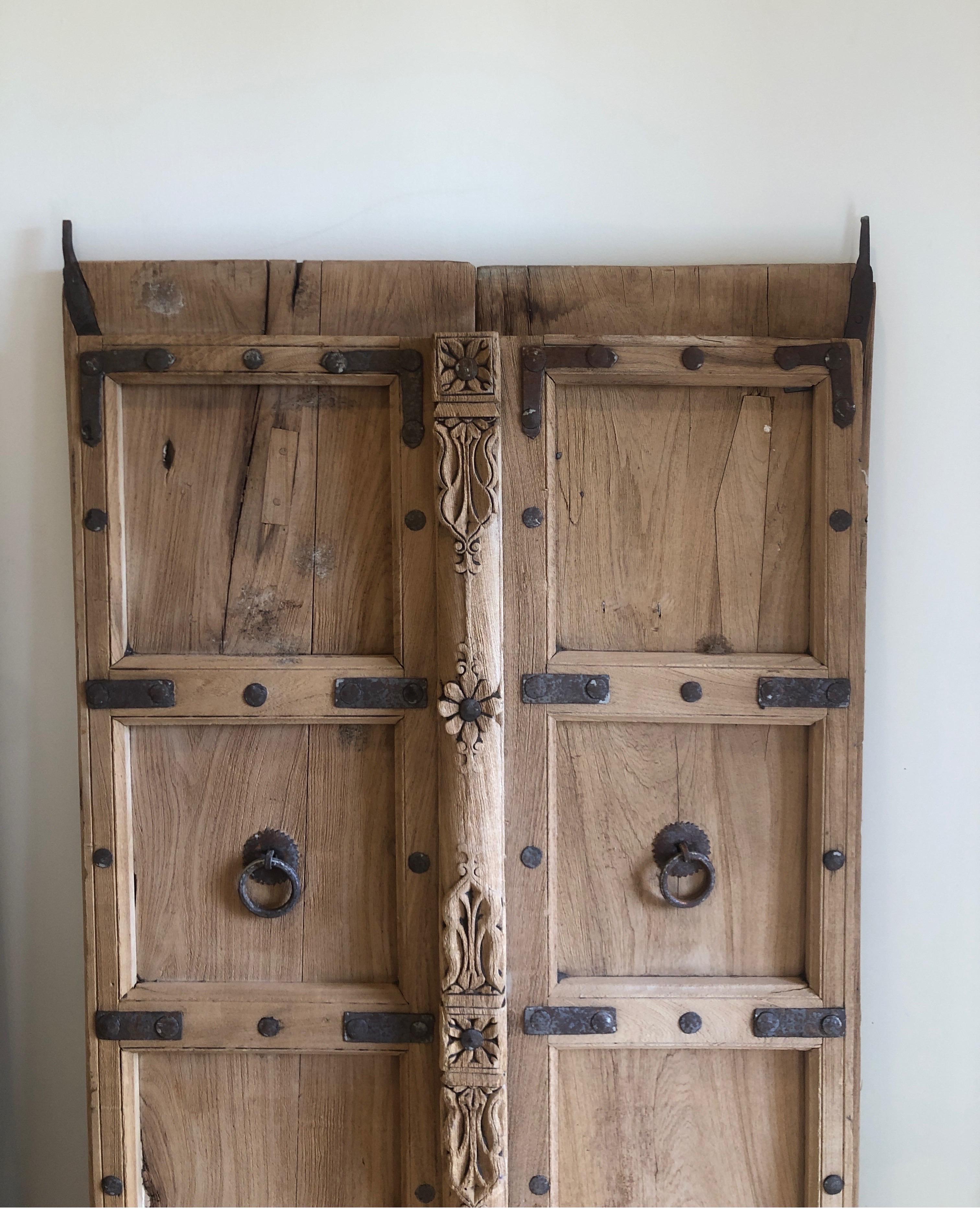 Pair of Antique Carved Teakwood and Iron Indian Doors In Good Condition In Los Angeles, CA