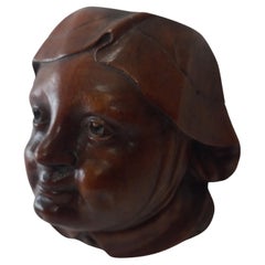 Pair of antique carved wall sculptures