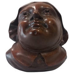 Pair of antique carved wall sculptures