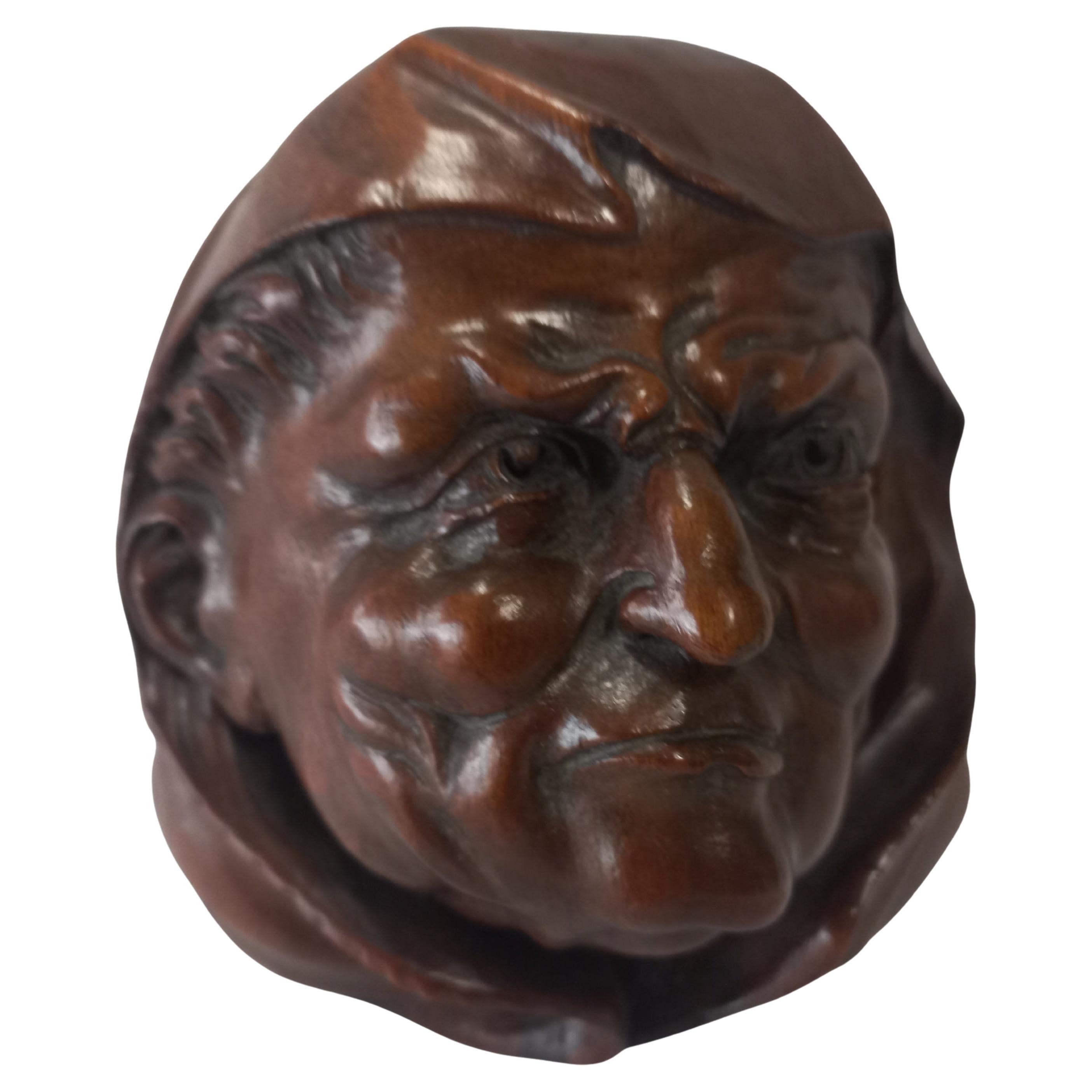 Paar antike geschnitzte Wandskulpturen (Hartholz) im Angebot