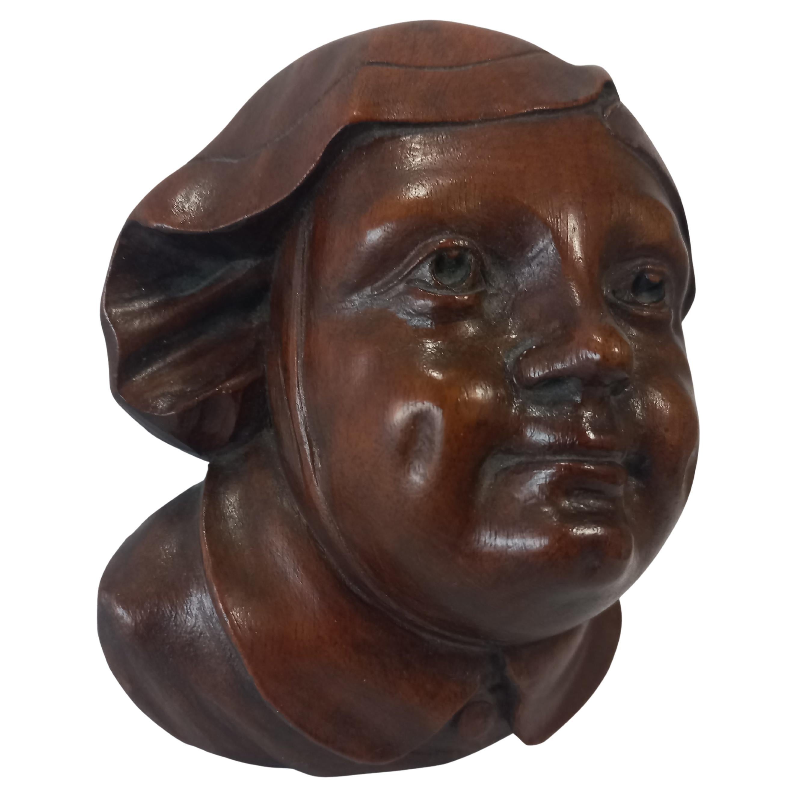 Coppia di antiche sculture da parete intagliate