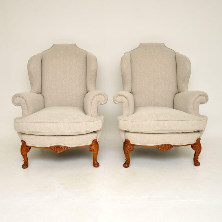Queen Anne Pair of Antique Carved Walnut Wing Back Armchairs For Sale