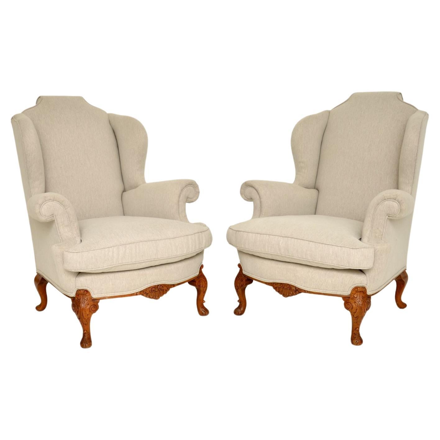 Pair of Antique Carved Walnut Wing Back Armchairs