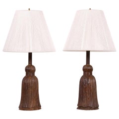 Pair of Antique Carved Wood Tassel Form Lamps