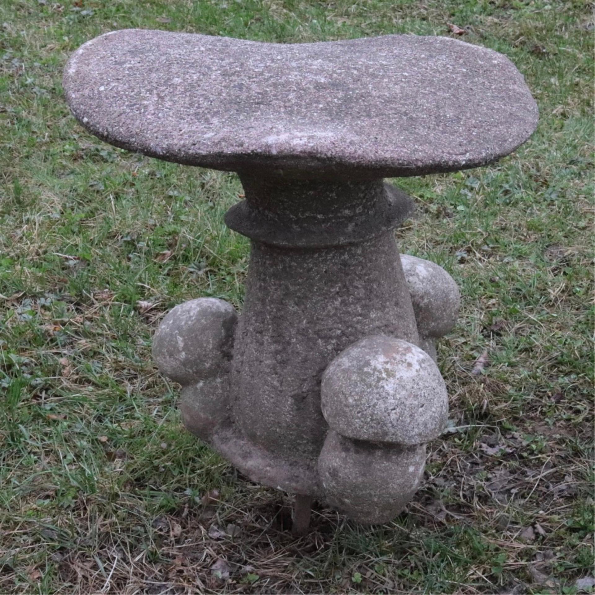 The pair of wonderfully charming cast cement toad stools make a welcome addition to any garden. These large hand cast stone mushrooms have a naturalistic patina,-- great garden ornament, sculptures or statues.
 