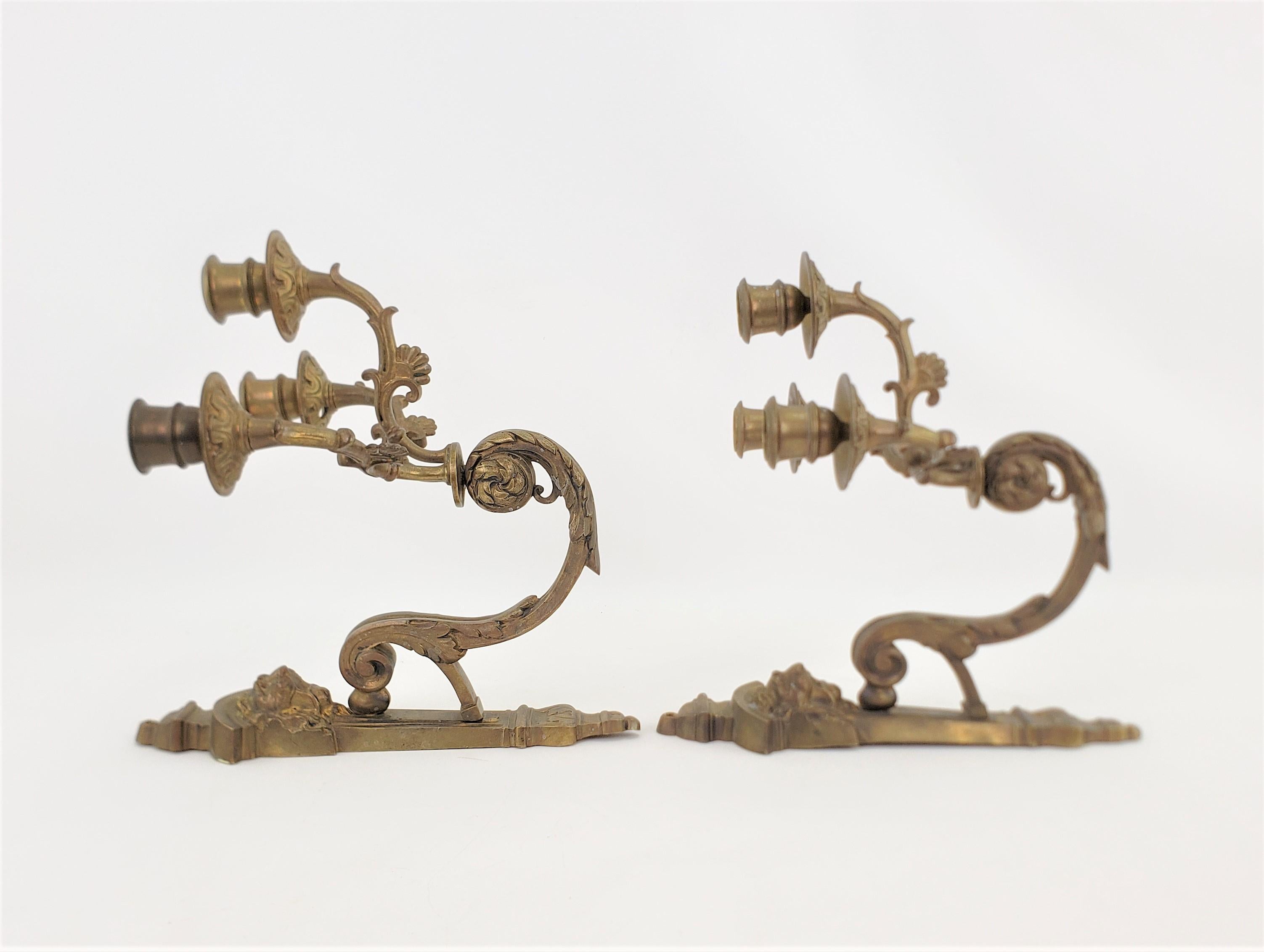 High Victorian Pair of Antique Cast & Gilt Bronze Candle Sconces with Lion Head Decoration For Sale
