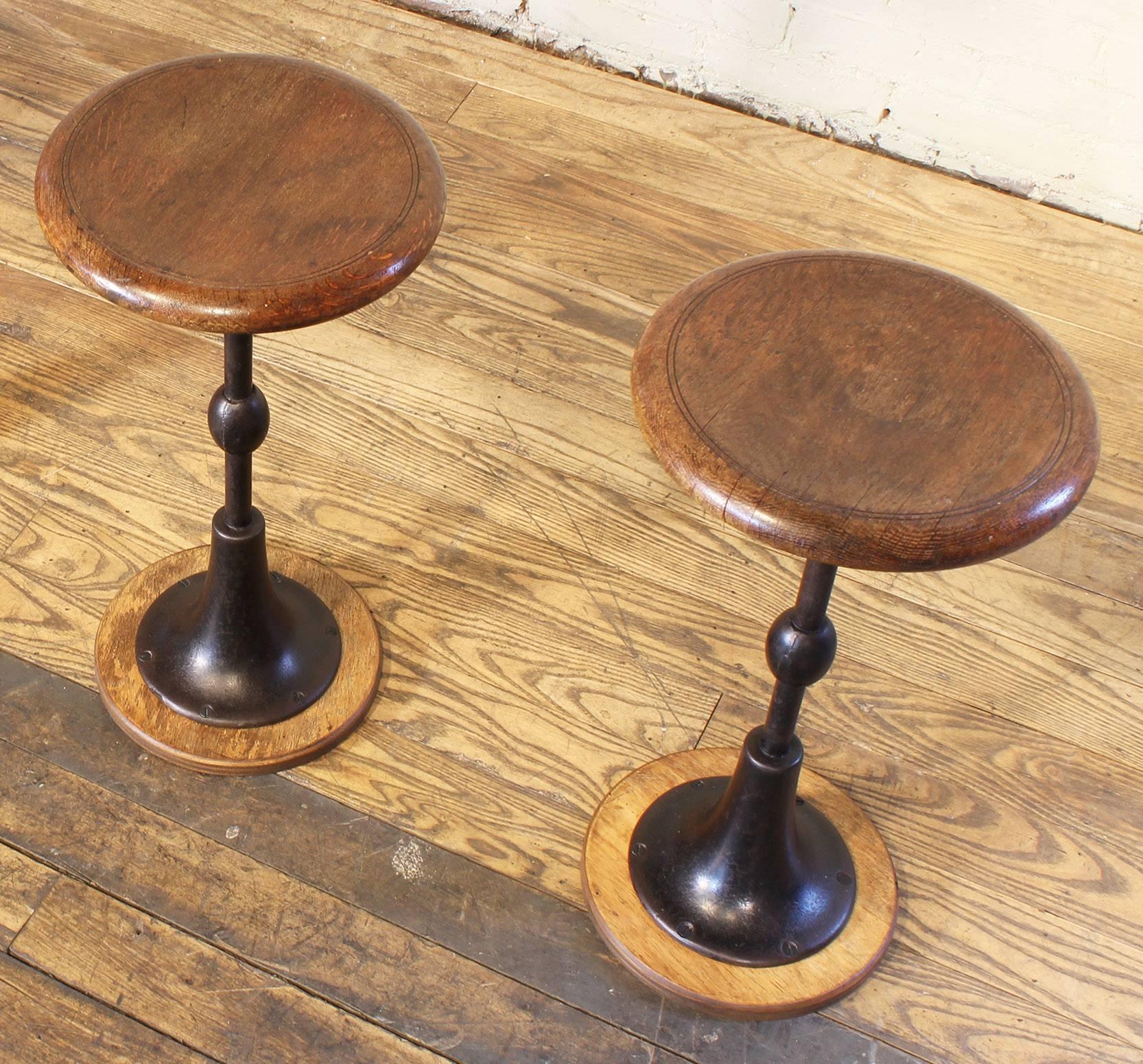 American Pair of Antique Cast Iron and Oak Pedestal Stools