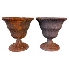 Pair of Antique Cast Iron Garden Urn Planters with Weathered Patina